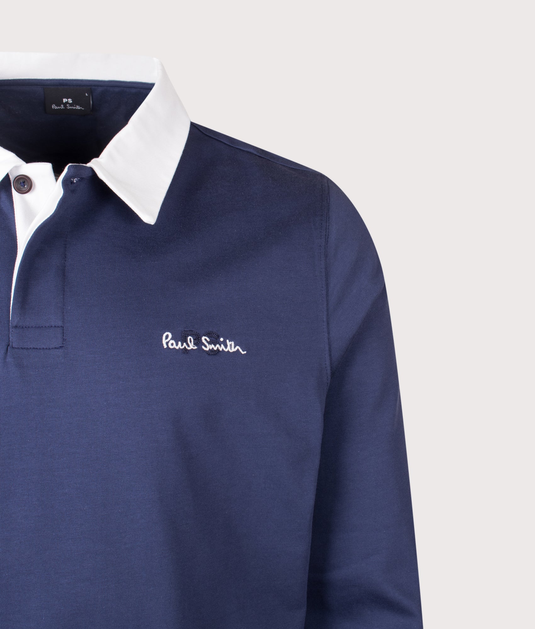 PS Paul Smith Casual Fit PS Logo Rugby Top in Inky Blue at EQVVS Menswear. Detail shot.