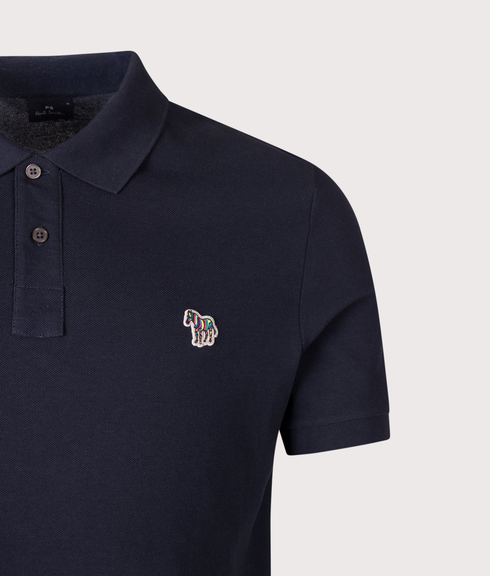 PS Paul Smith Zebra Logo Polo Shirt in Dark Navy at EQVVS Menswear. Detail shot.