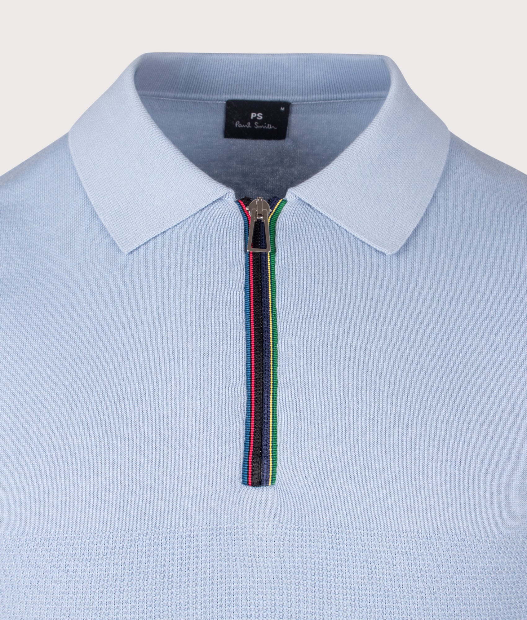 PS Paul Smith Regular Fit Knitted Quarter Zip Polo Shirt in Blue at EQVVS Menswear. Detail shot.