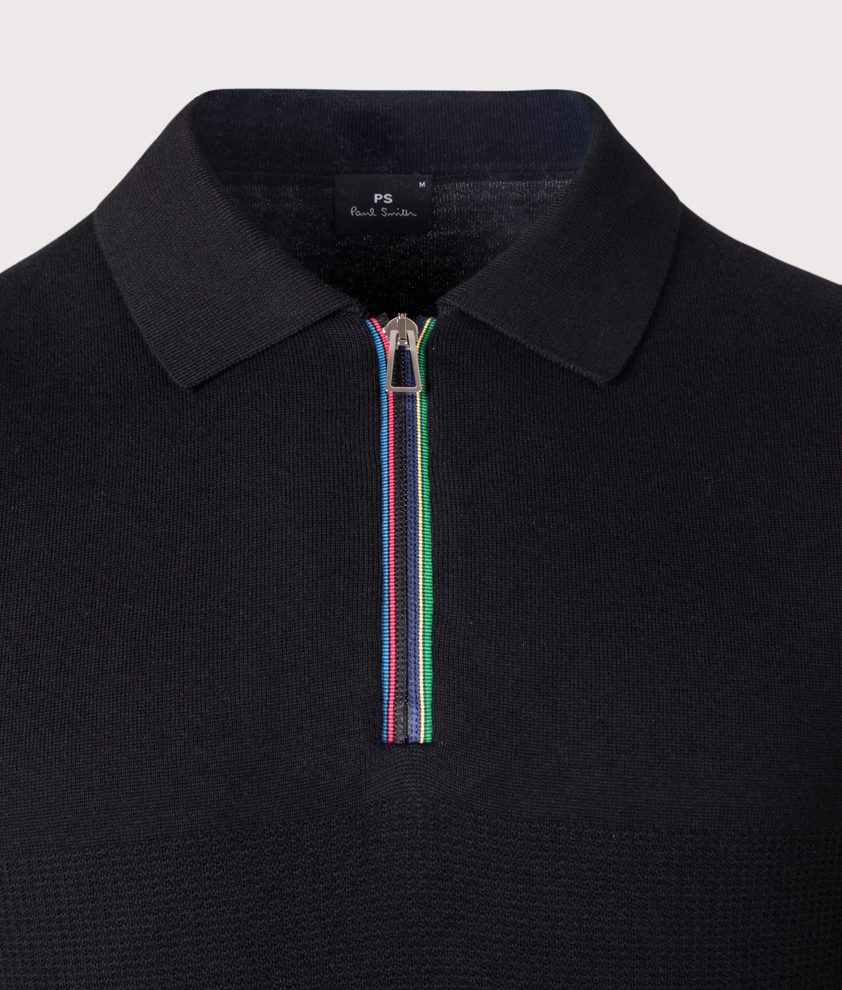 PS Paul Smith Regular Fit Knitted Quarter Zip Polo Shirt in Black at EQVVS Menswear. Front shot.