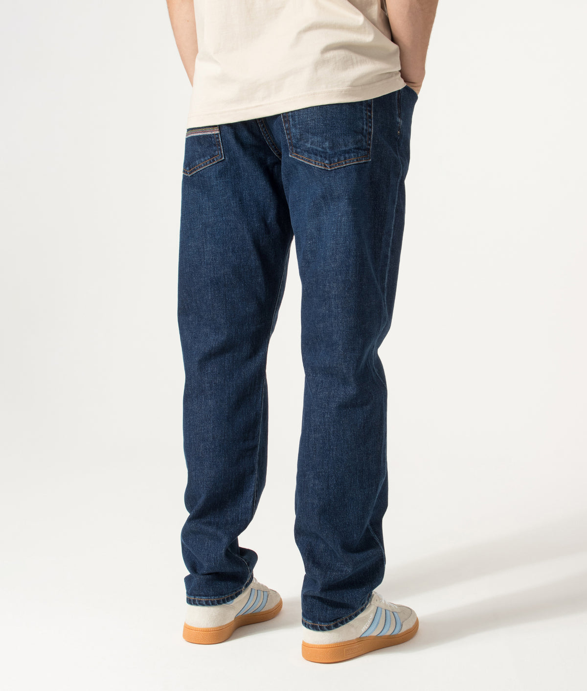 PS Paul Smith Relaxed Tapered Fit Jeans in Dark Colour Wash at EQVVS Menswear. Angled model back shot.