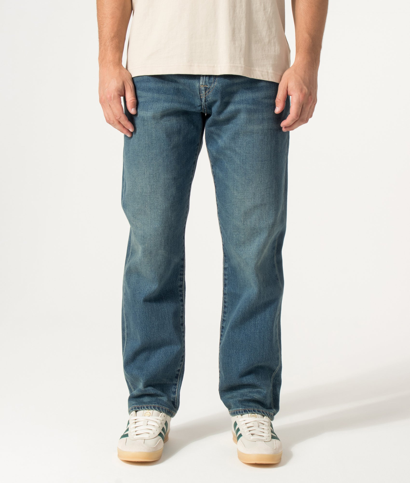 PS Paul Smith Relaxed Tapered Fit Jeans in Vintage Wash at EQVVS Menswear. Model front shot.