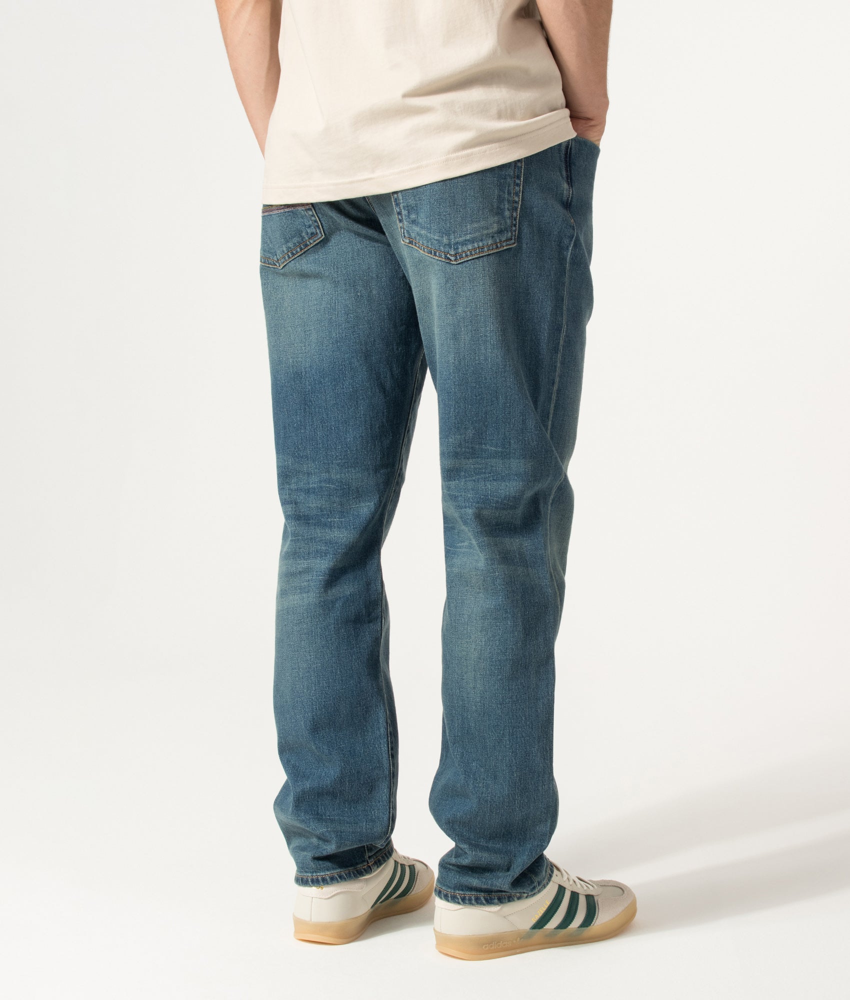 PS Paul Smith Relaxed Tapered Fit Jeans in Vintage Wash at EQVVS Menswear. Angled model back shot.