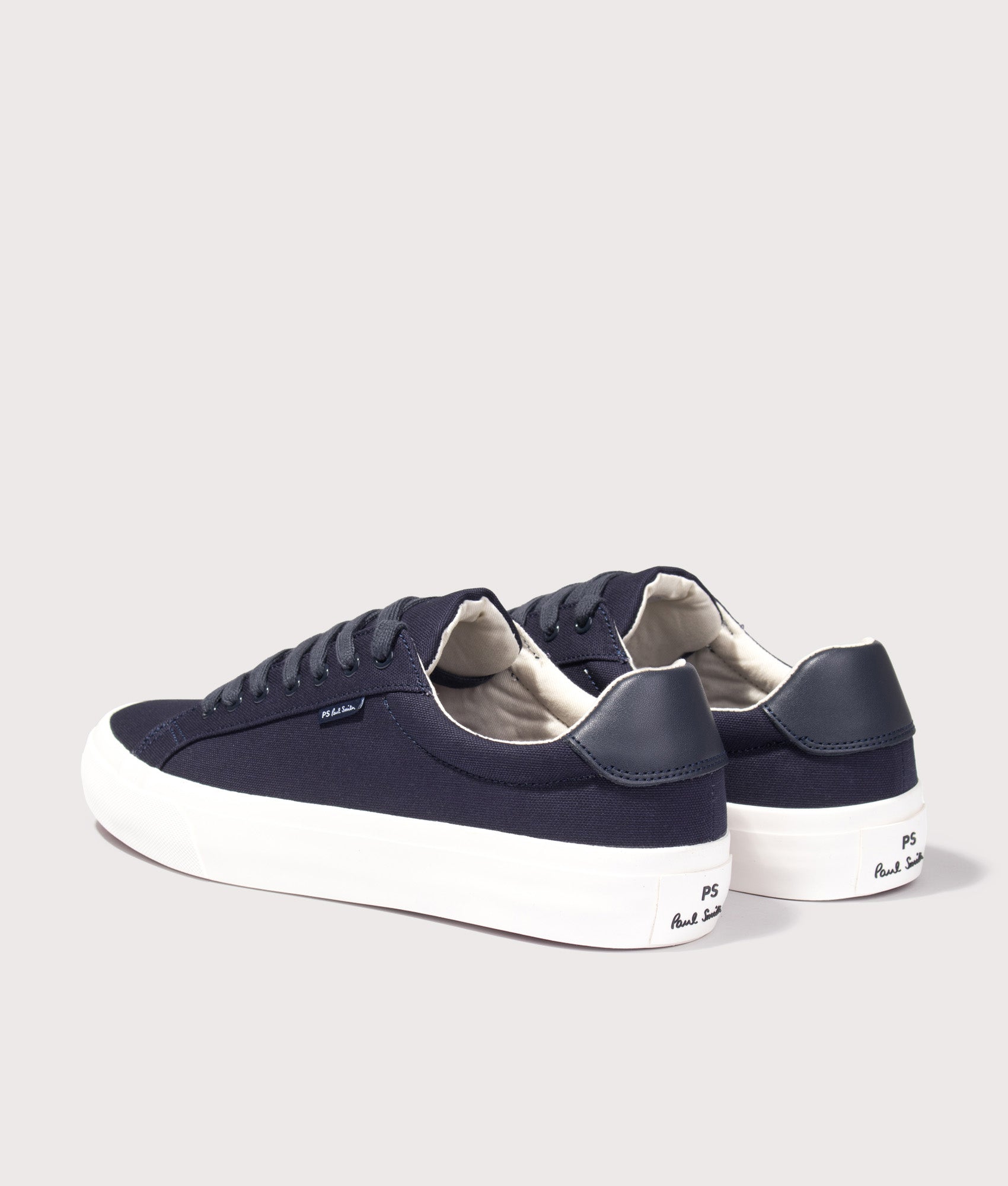 PS Paul Smith Amos Trainers in Navy at EQVVS Menswear. Angled back shot.