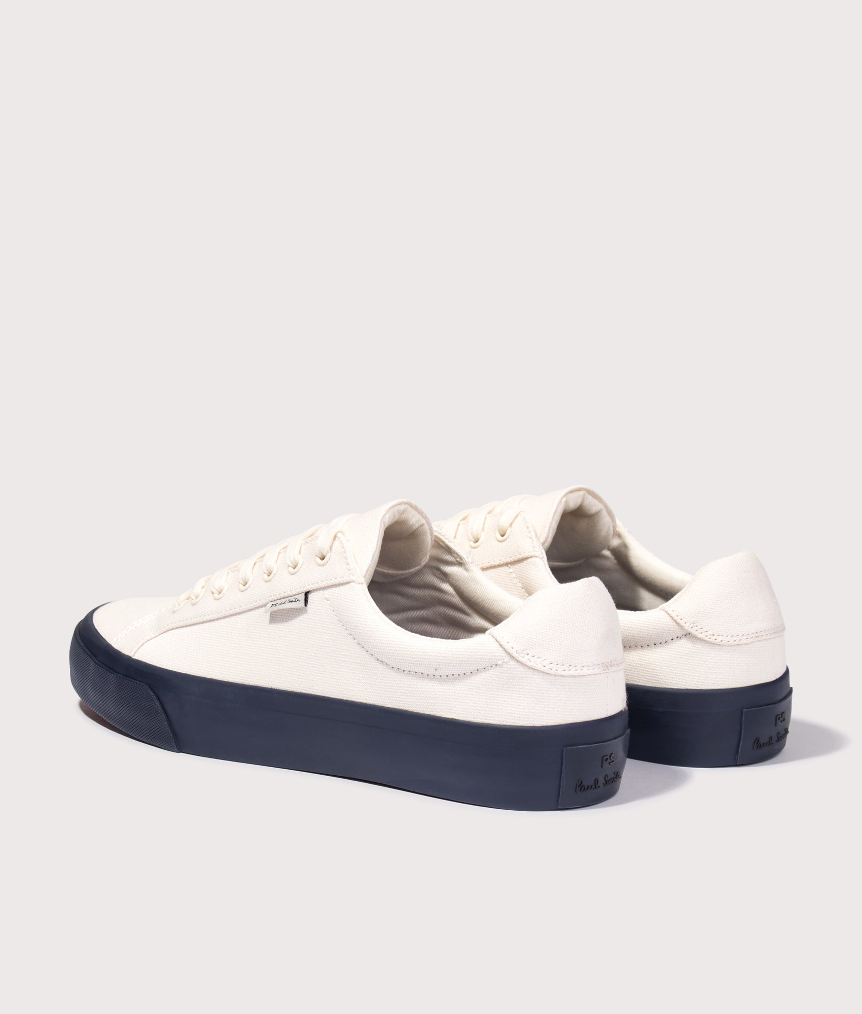 PS Paul Smith Amos Trainers in Off White at EQVVS Menswear.  Angled back shot.
