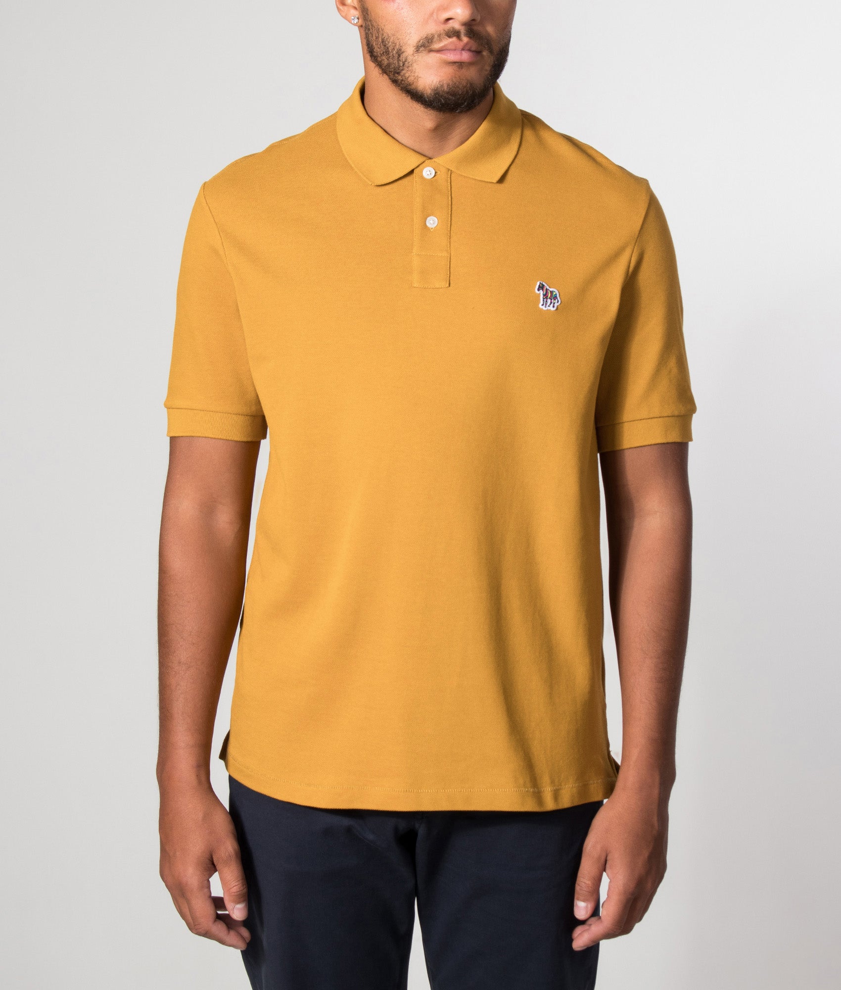 PS Paul Smith Regular Fit Zebra Polo Shirt in Ochre at EQVVS Menswear. Model front shot.
