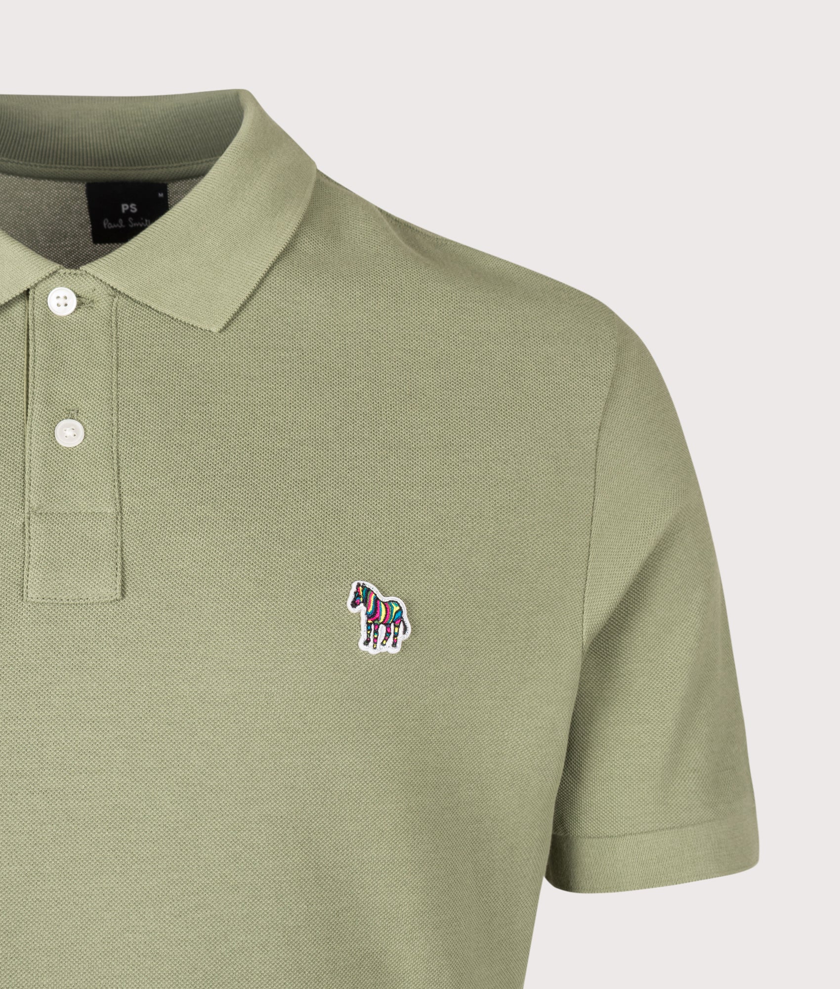 PS Paul Smith Regular Fit Zebra Polo Shirt in Light Greyish Green at EQVVS Menswear. Detail shot.