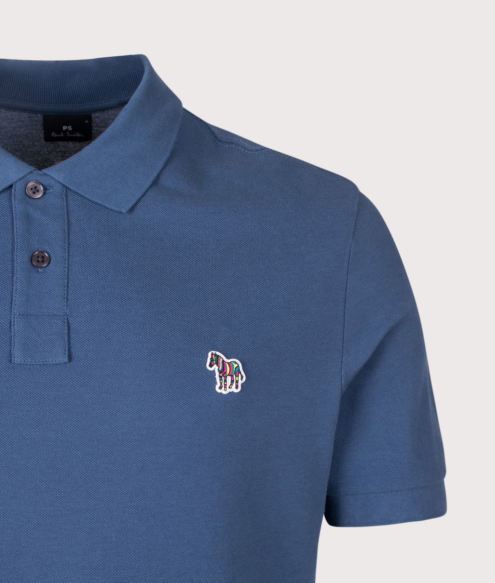 PS Paul Smith Regular Fit Zebra Polo Shirt in Indigo at EQVVS Menswear. Detail shot.