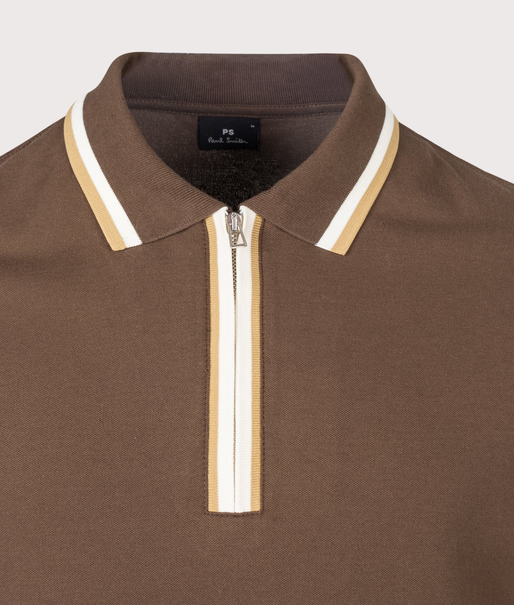 PS Paul Smith Regular Fit Quarter Zip Polo Shirt in Brown at EQVVS Menswear. Detail shot.