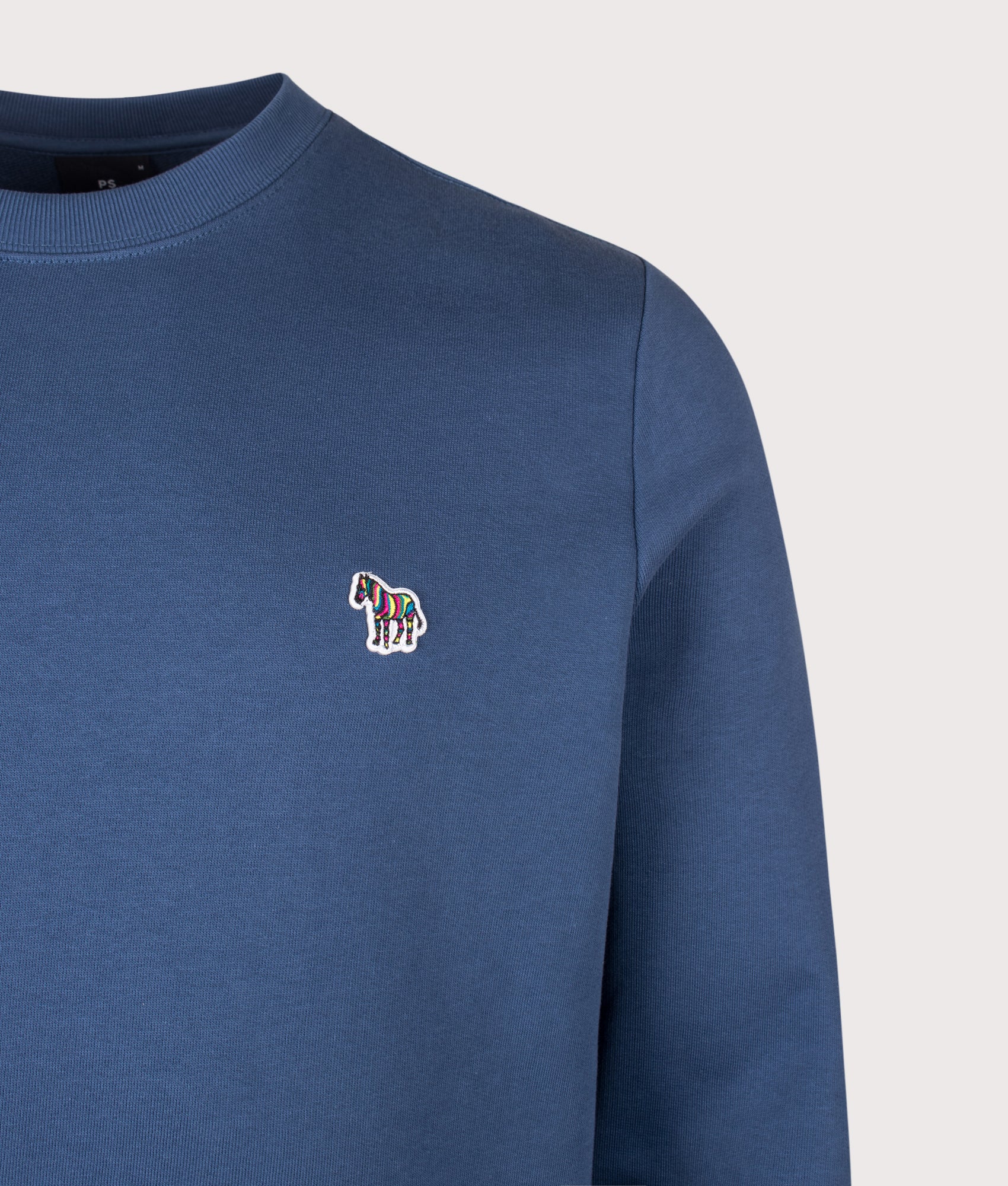 PS Paul Smith Organic Cotton Zebra Logo Sweatshirt in Indigo at EQVVS Menswear. Detail shot.