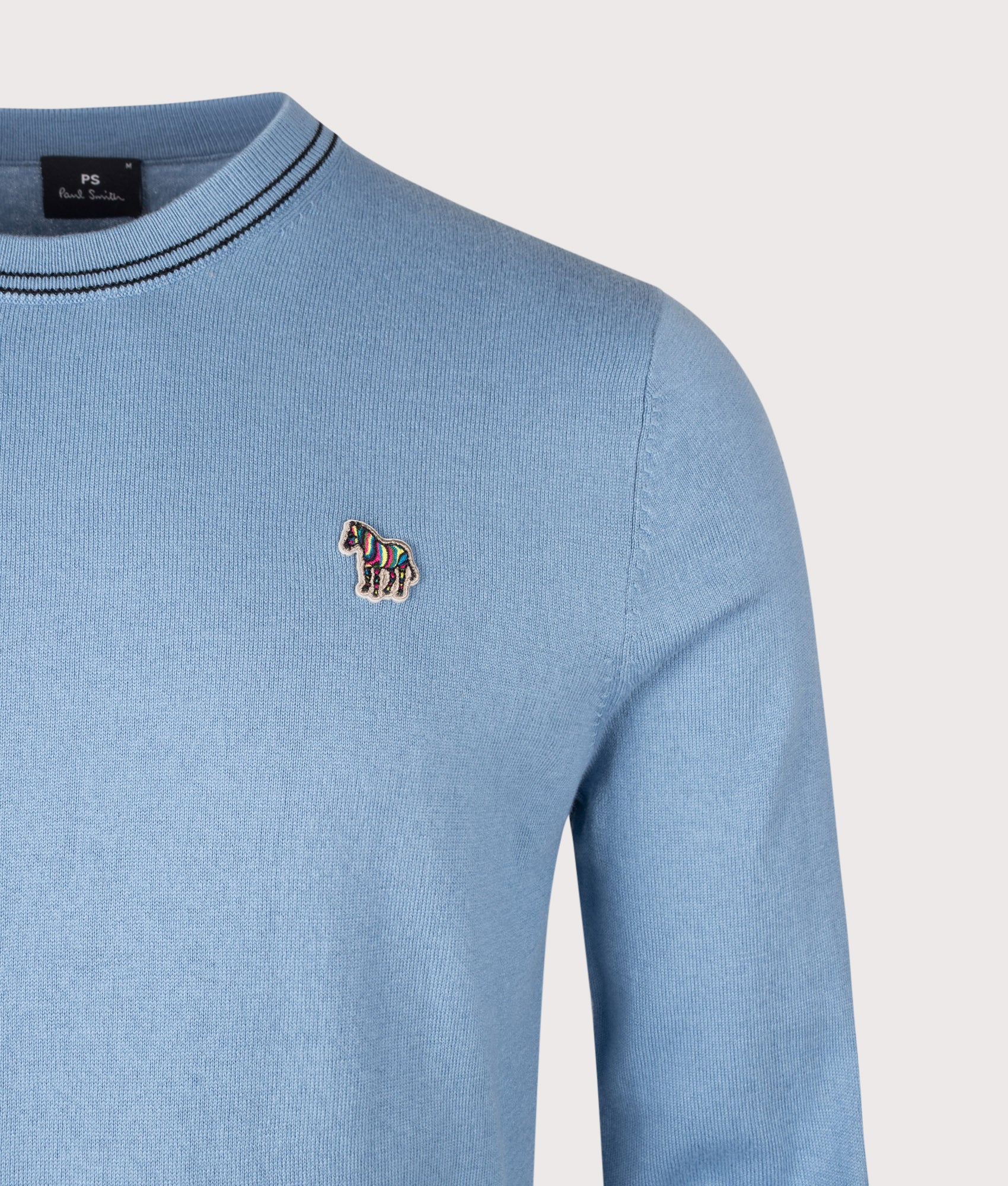 PS Paul Smith Regular Fit Zebra Logo Crewneck jumper in Light Blue at EQVVS Menswear. Detail shot.