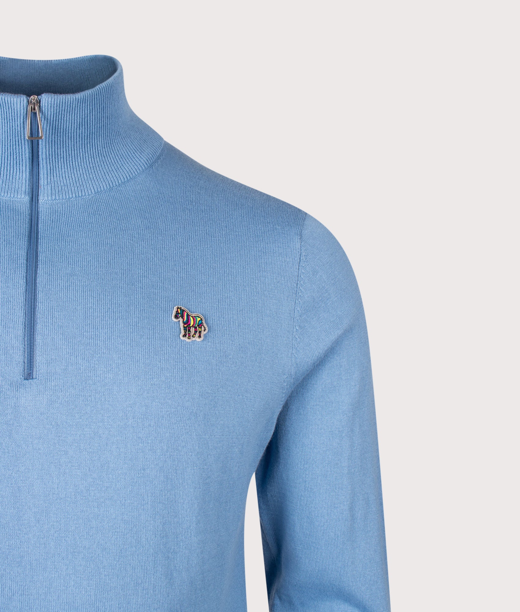 PS Paul Smith Regular Fit Zebra Logo Quarter Zip Jumper in Light Blue at EQVVS Menswear. Detail shot.