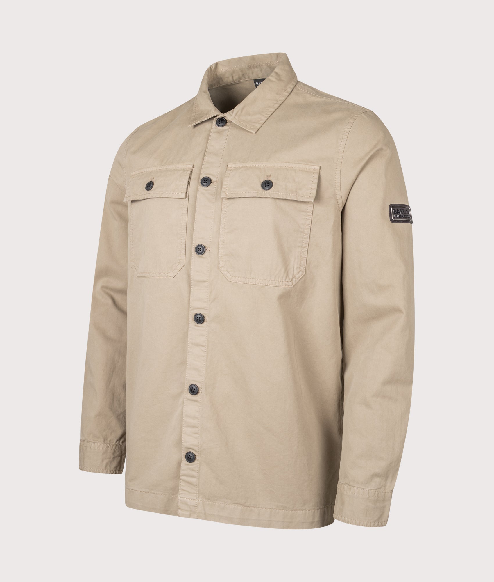 Barbour B.Intl Arlo Overshirt in Coriander at EQVVS Menswear. Angled front shot.