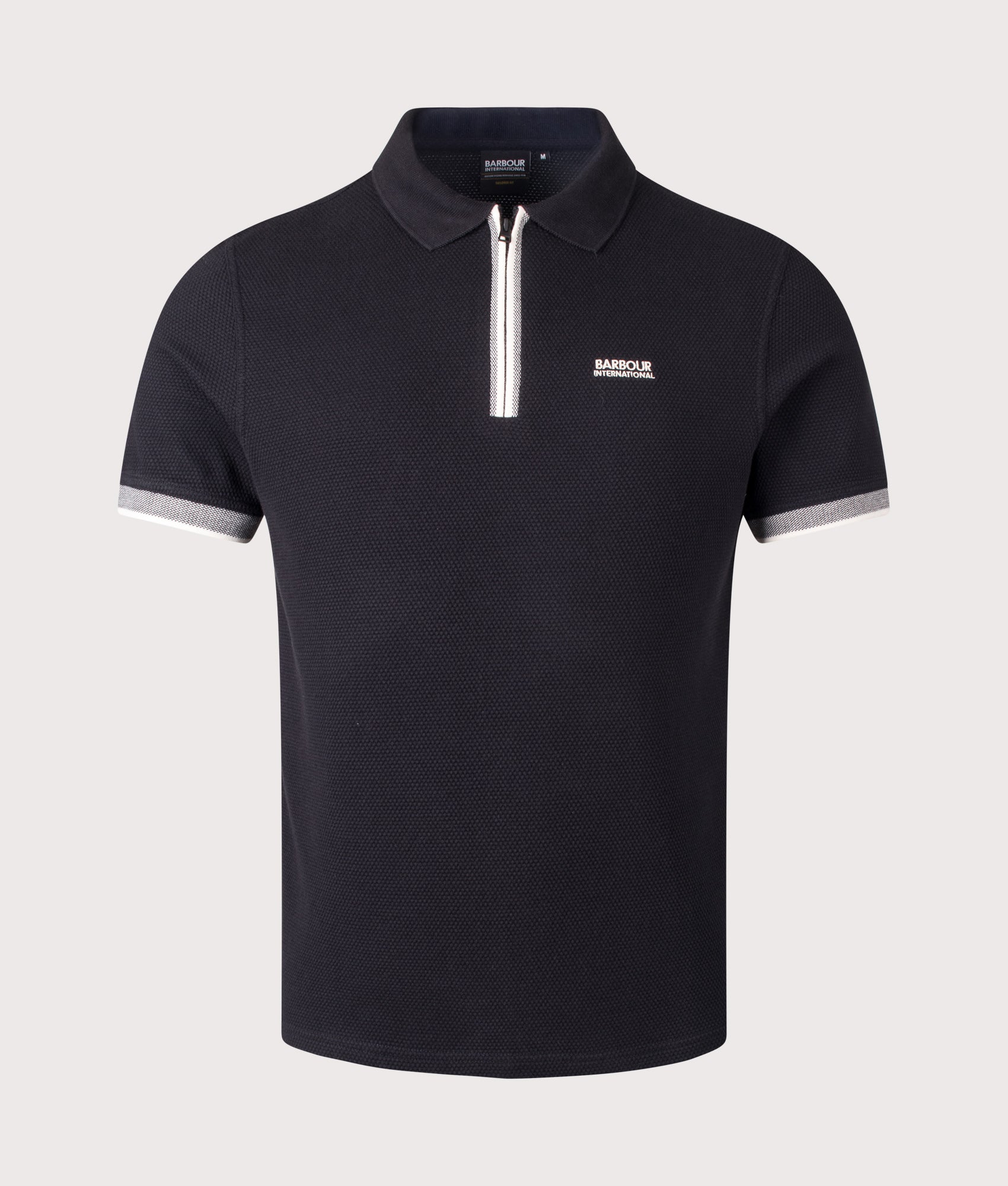 Barbour International B.Intl Swinford Polo shirt in Black at EQVVS Menswear. Front shot.