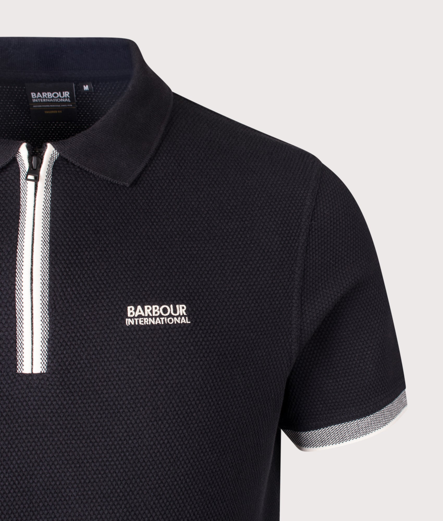 Barbour International B.Intl Swinford Polo shirt in Black at EQVVS Menswear. Detail shot. 