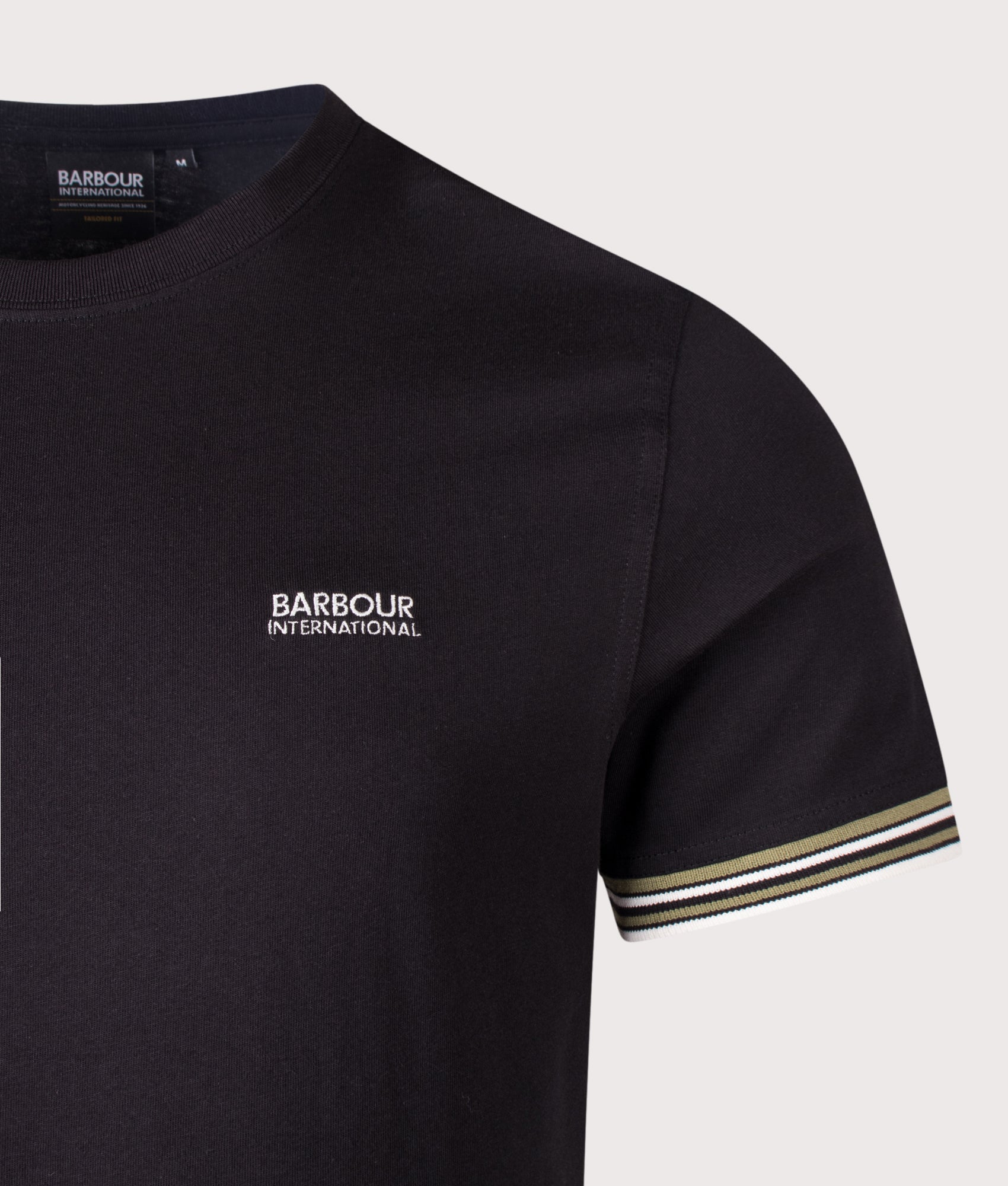 Burnwood Tipped Cuff T-Shirt in Black by Barbour International. Shot by EQVVS. Detail shot.