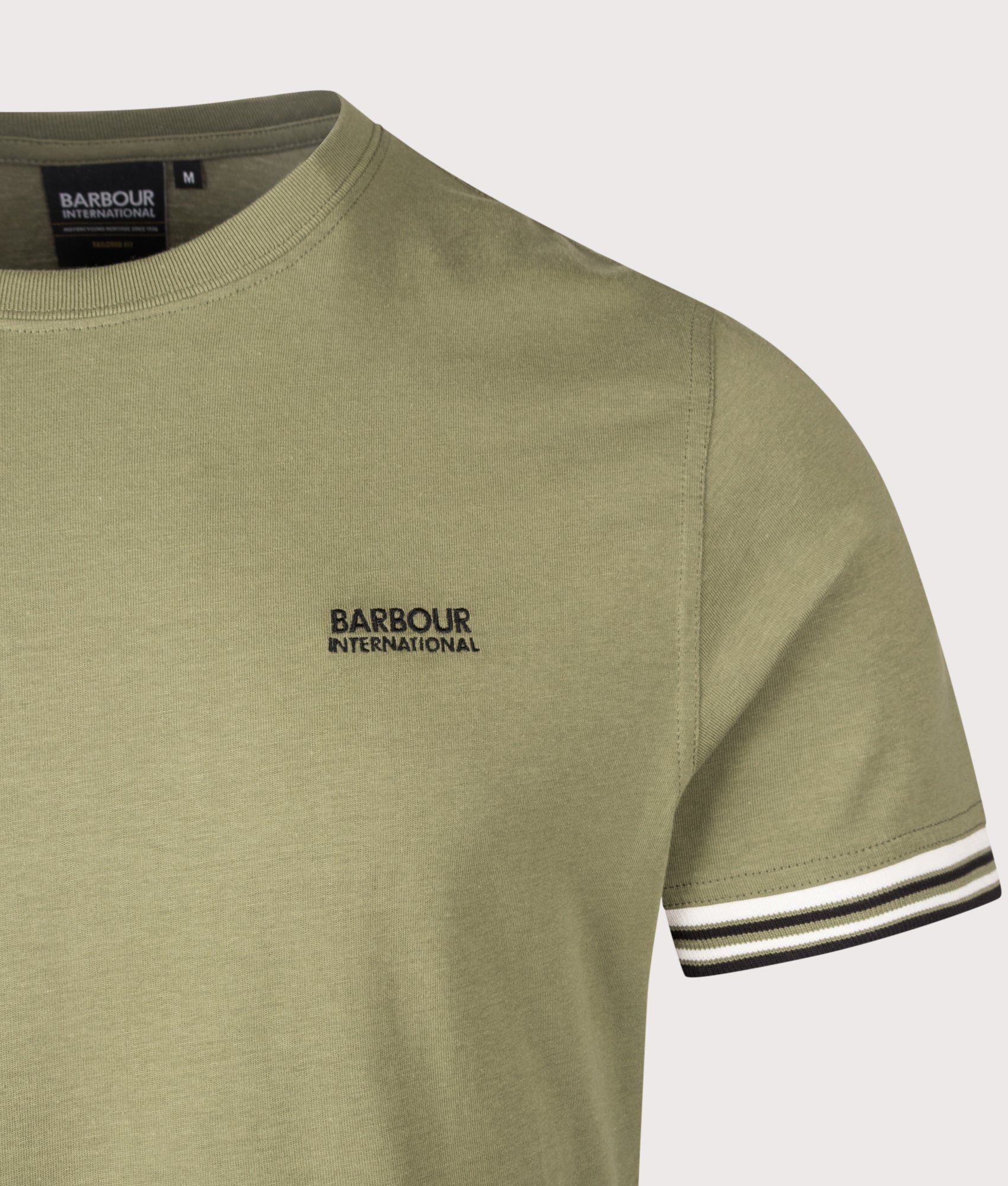 Burnwood Tipped Cuff T-Shirt in Burnt Olive by Barbour International. Shot by EQVVS. Detail shot.