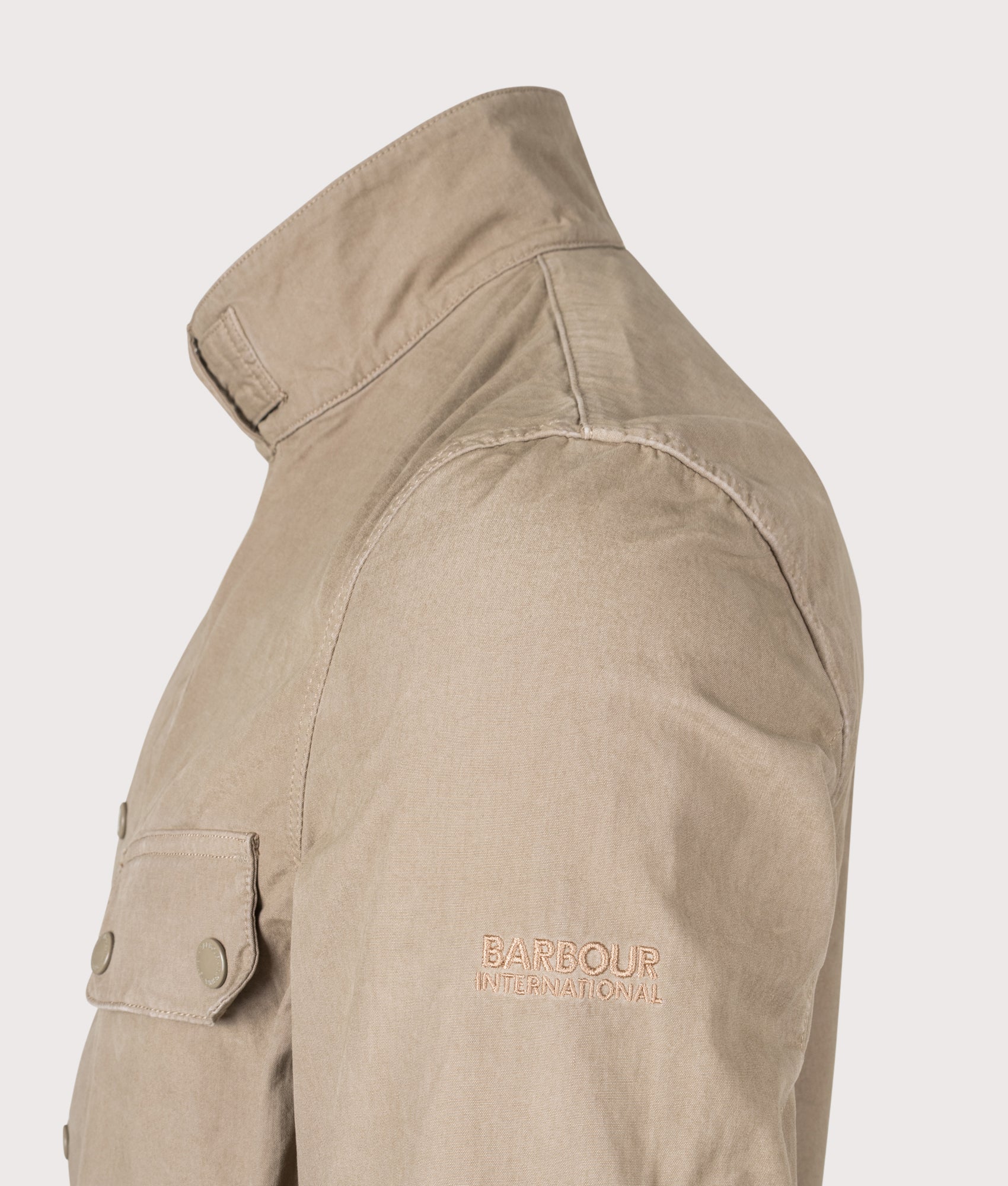 Barbour B.Intl Garment Dyed Duke Casual Jacket in Timberwolf at EQVVS Menswear. Detail shot.