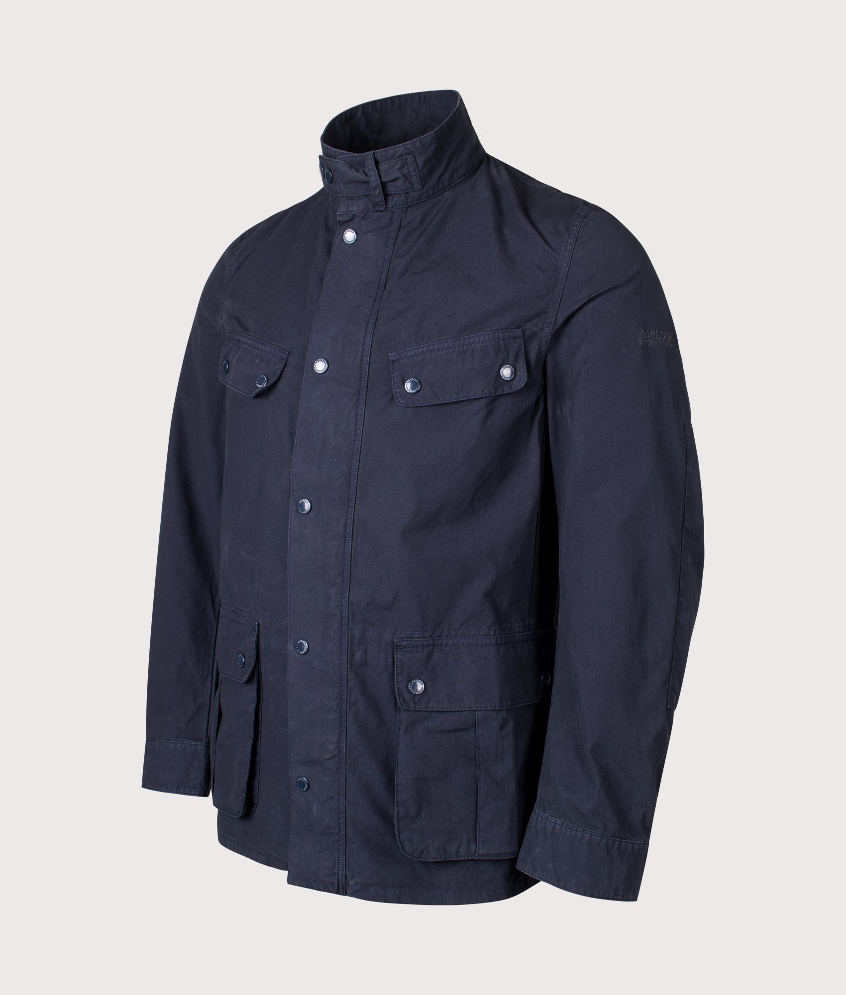Barbour B.Intl Garment Dyed Duke Casual Jacket in Navy at EQVVS Menswear. Angled front shot.