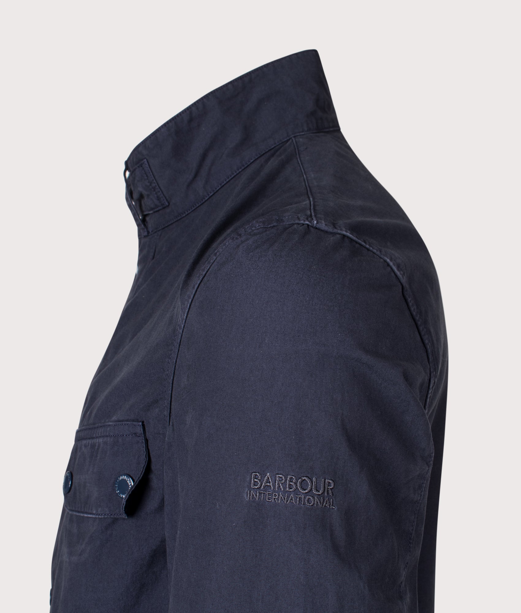 Barbour B.Intl Garment Dyed Duke Casual Jacket in Navy at EQVVS Menswear. Detail shot.