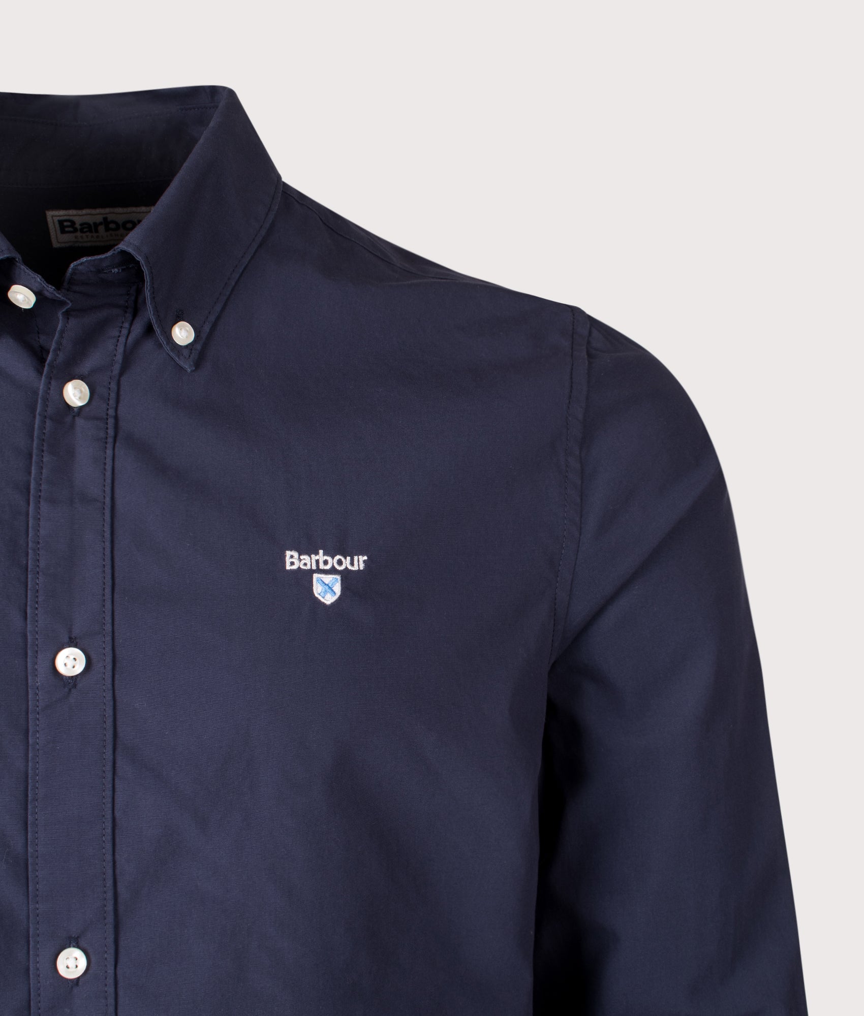Barbour Treeport Poplin Shirt in Navy at EQVVS Menswear. Detail shot.