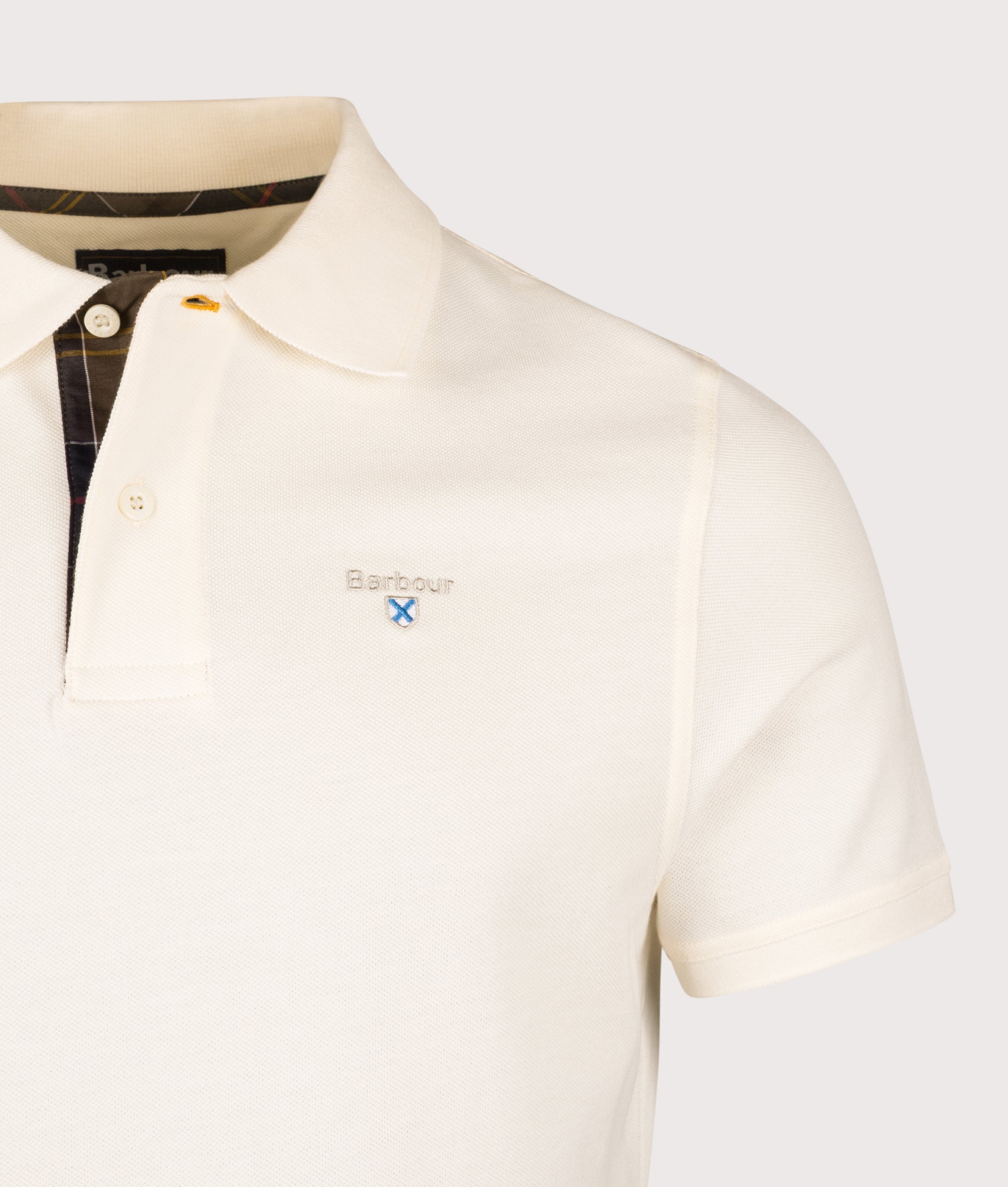 Barbour Tartan Pique Polo Shirt in Whisper White and Classic at EQVVS Menswear. Detail shot.