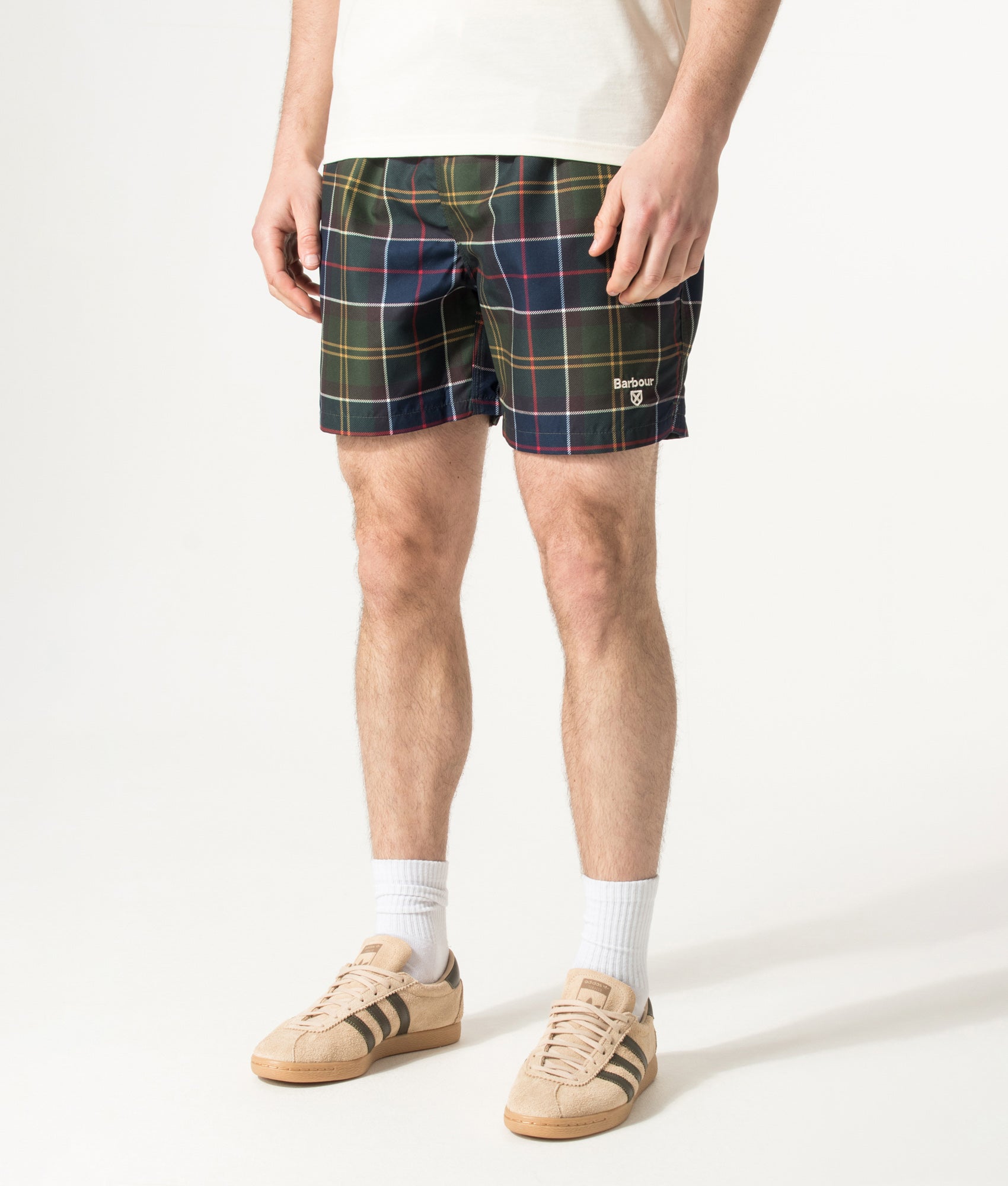 Barbour Lifestyle Staple Tartan Swim Shorts in Classic Tartan at EQVVS Menswear. Angled model front shot.