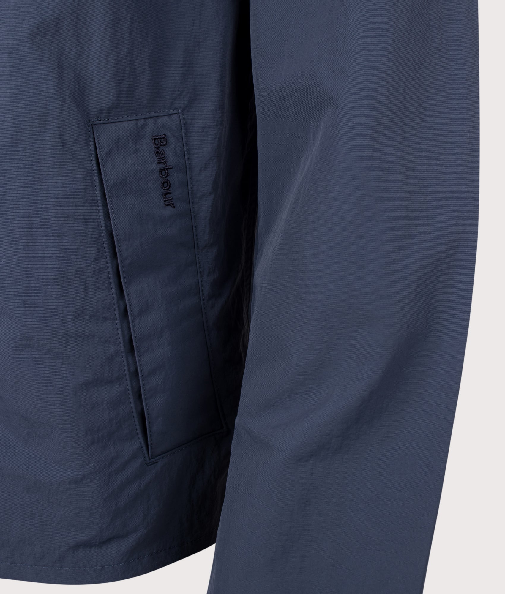 Barbour Lifestyle Tracker Showerproof Jacket in Navy at EQVVS Menswear. Detail shot.
