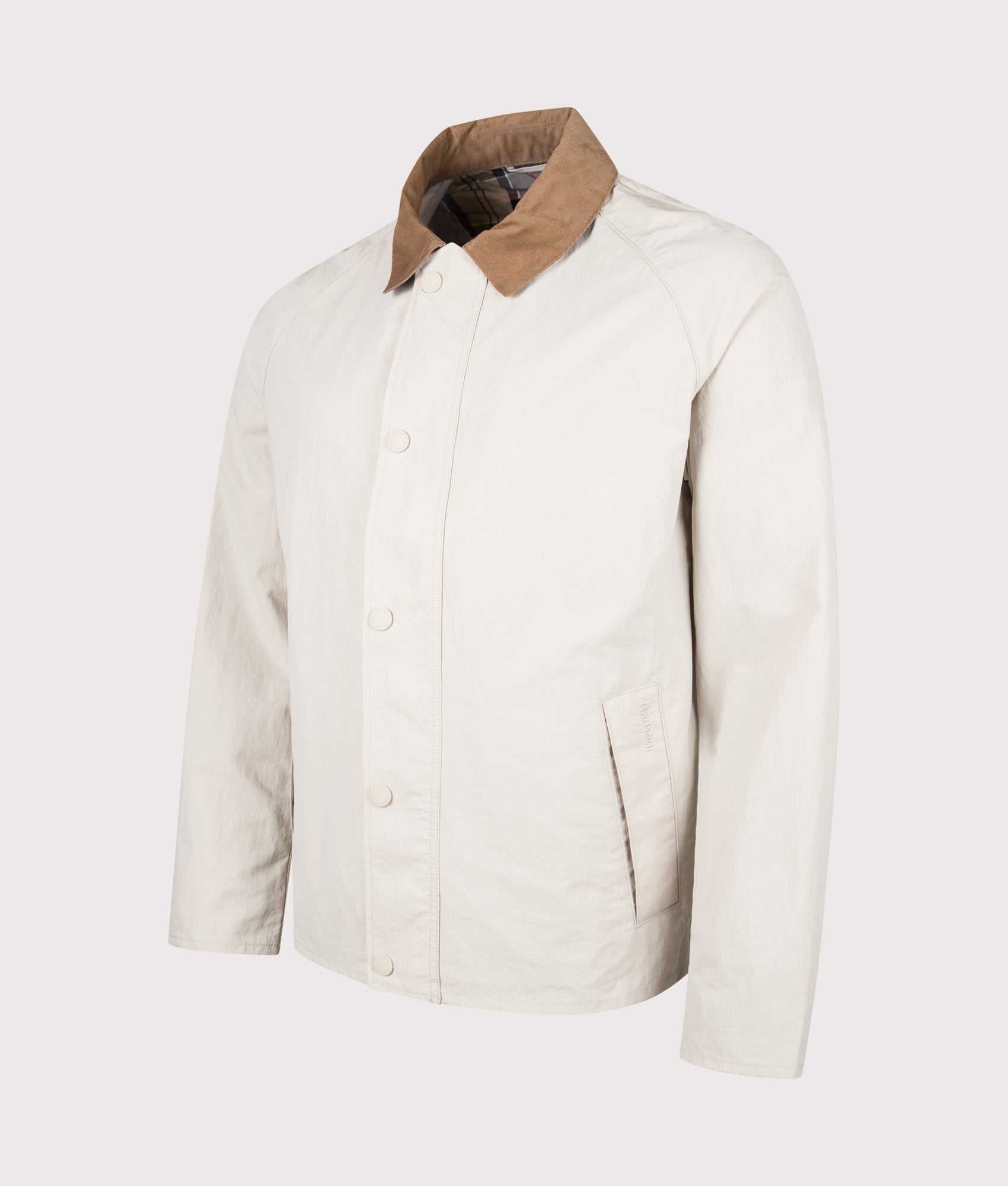 Barbour Lifestyle Tracker Showerproof Jacket in Mist at EQVVS Menswear. Angled front shot.