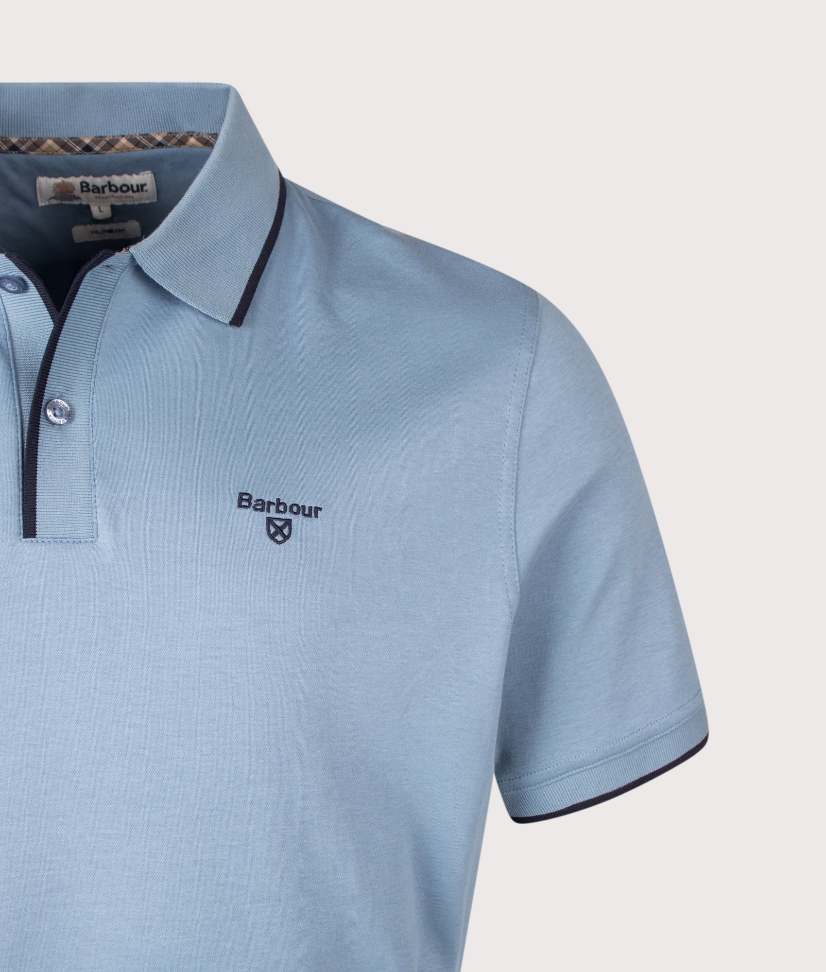 Barbour Lifestyle Callock Tailored Polo Shirt in Tarn Blue at EQVVS Menswear. Detail shot.