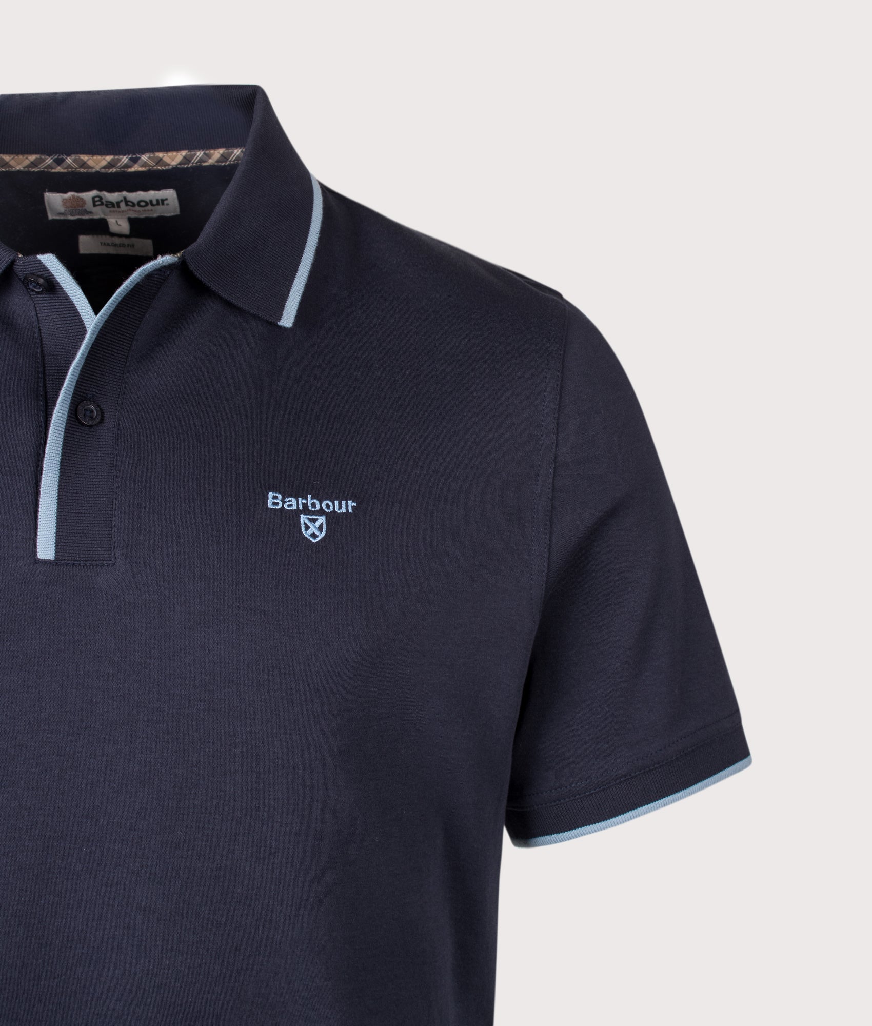 Barbour Lifestyle Callock Tailored Polo Shirt in Navy at EQVVS Menswear. Detail shot.