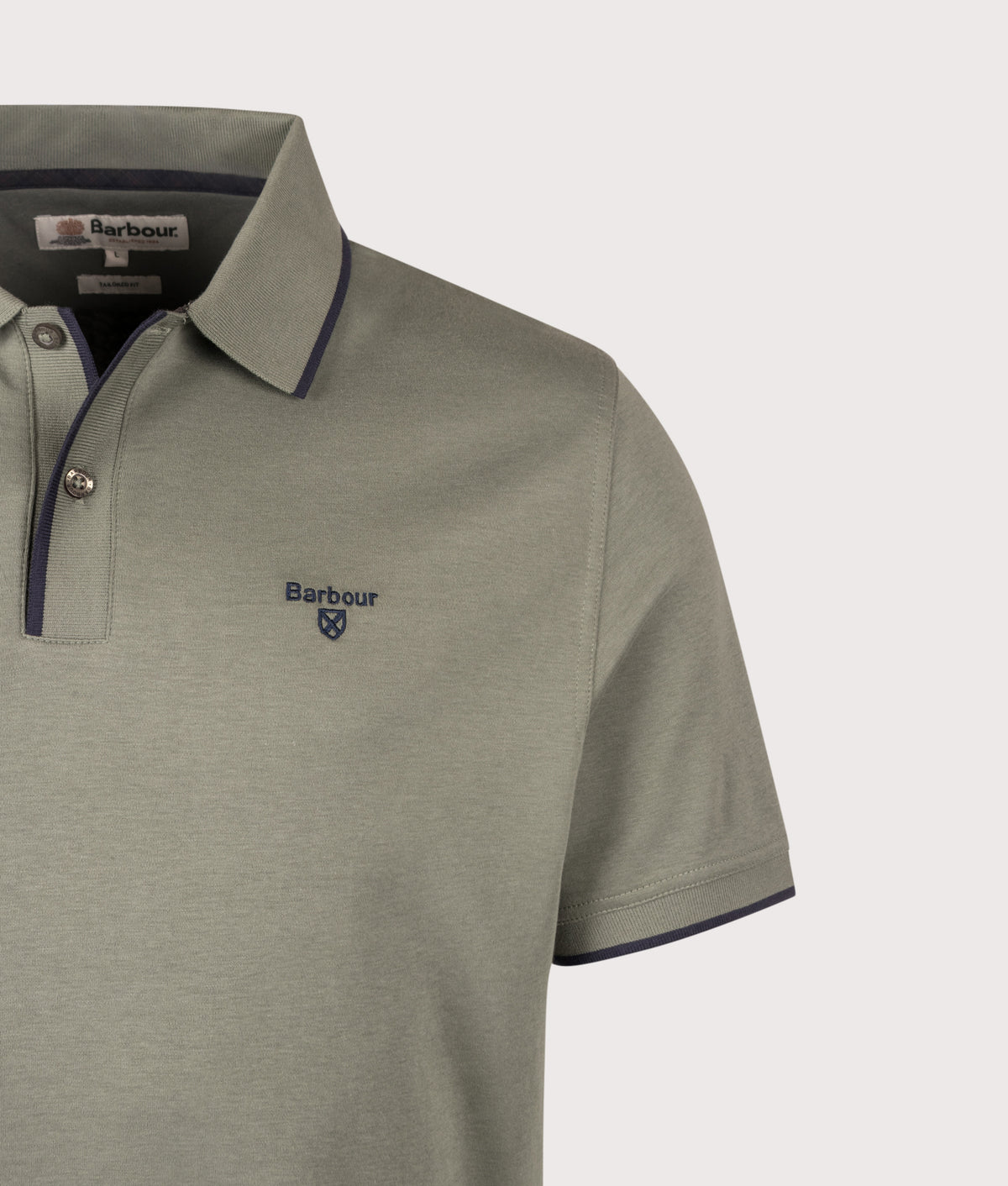 Barbour Lifestyle Callock Tailored Polo Shirt in Agave Green at EQVVS Menswear. Detail shot.