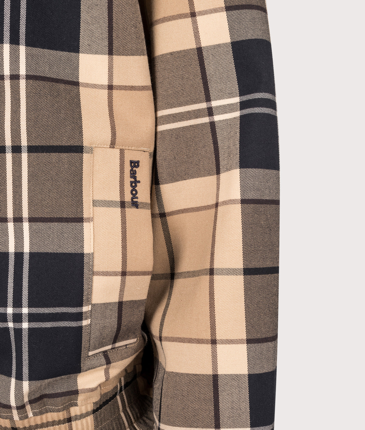 Barbour Lifestyle Tartan Showerproof Blouson Jacket in Birchwood Dress Tartan at EQVVS Menswear. Model detail shot.