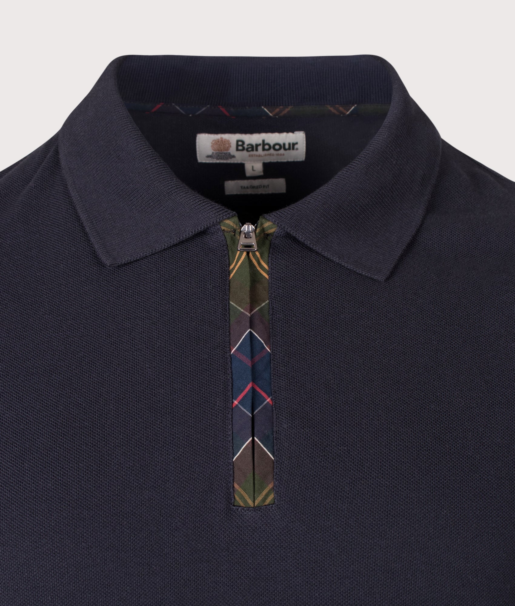 Barbour Lifestyle Tailored Fit Stately Quarter Zip Polo Shirt in Navy at EQVVS Menswear. Detail shot.