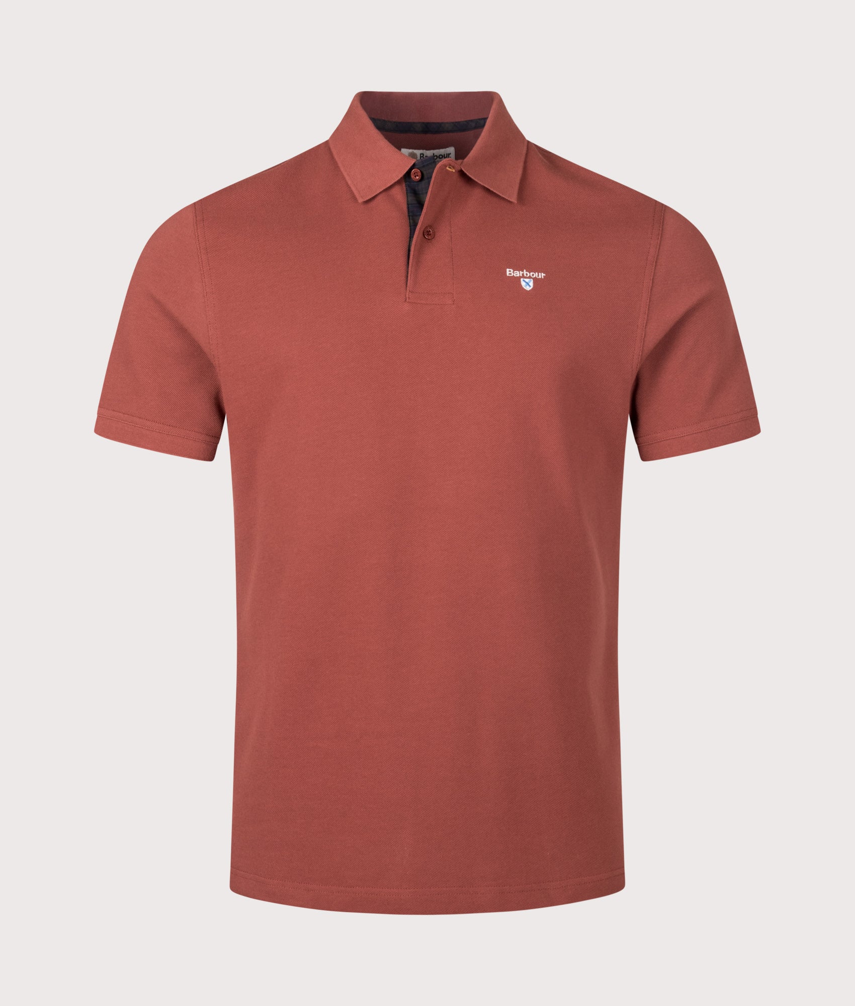 Barbour Tartan Pique Polo Shirt in Russet at EQVVS Menswear. Front shot.