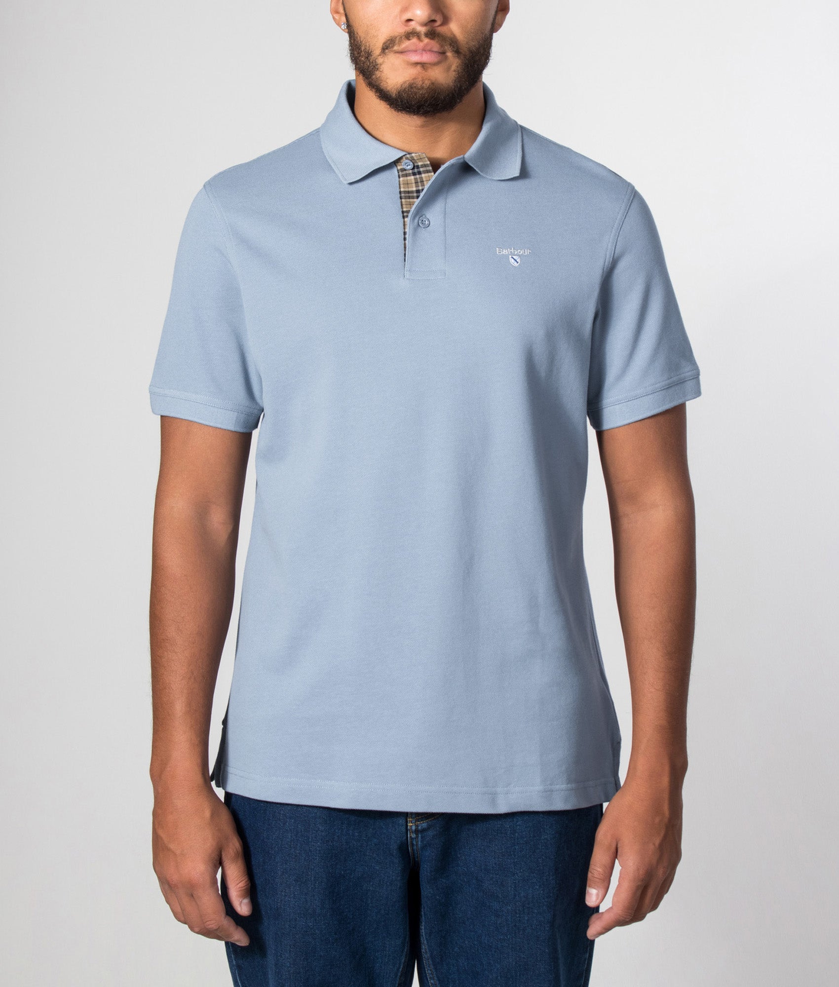 Barbour Tartan Pique Polo Shirt in Tarn Blue at EQVVS Menswear. Model front shot.