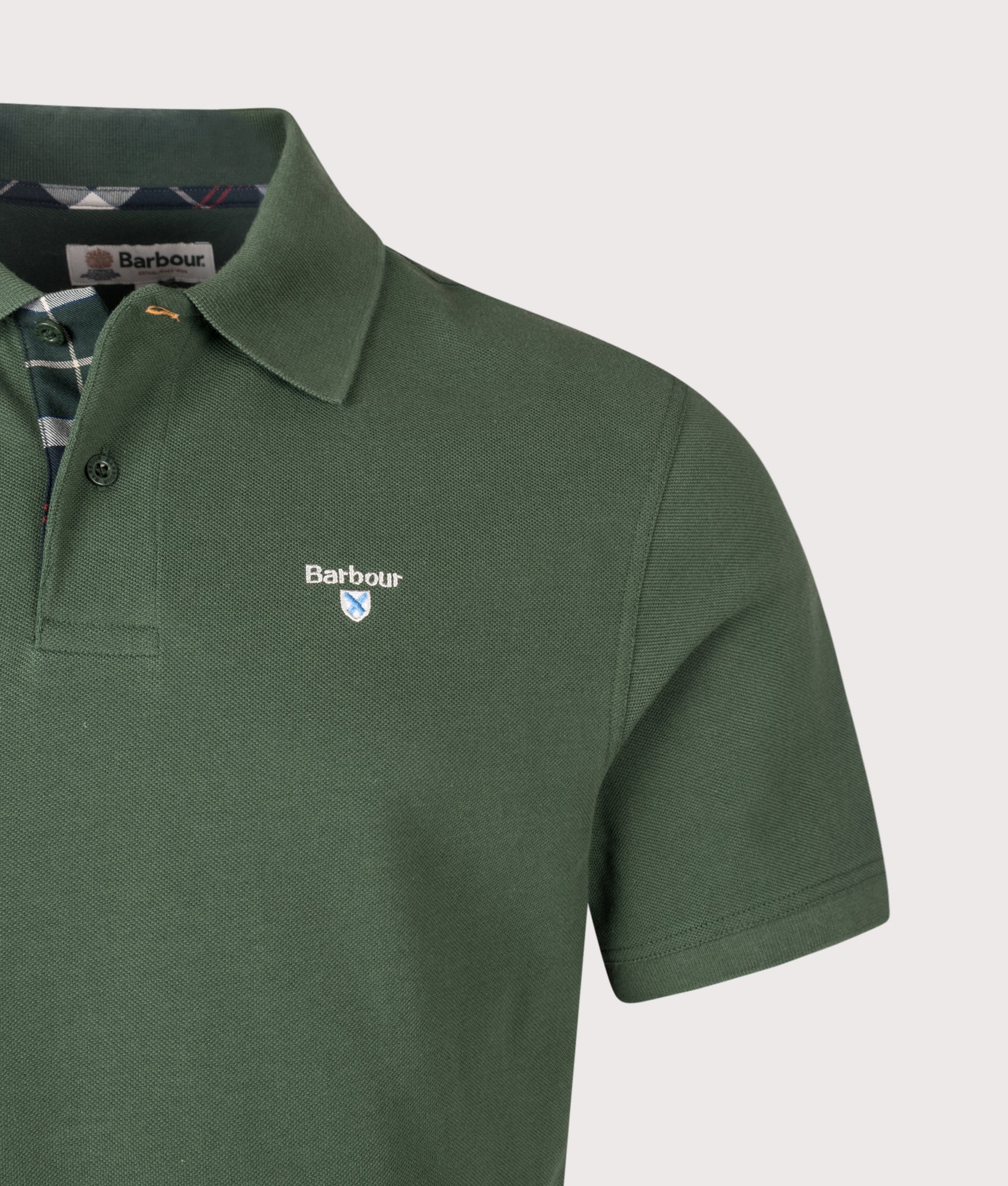 Barbour Tartan Pique Polo Shirt in Sycamore at EQVVS Menswear. Detail shot.