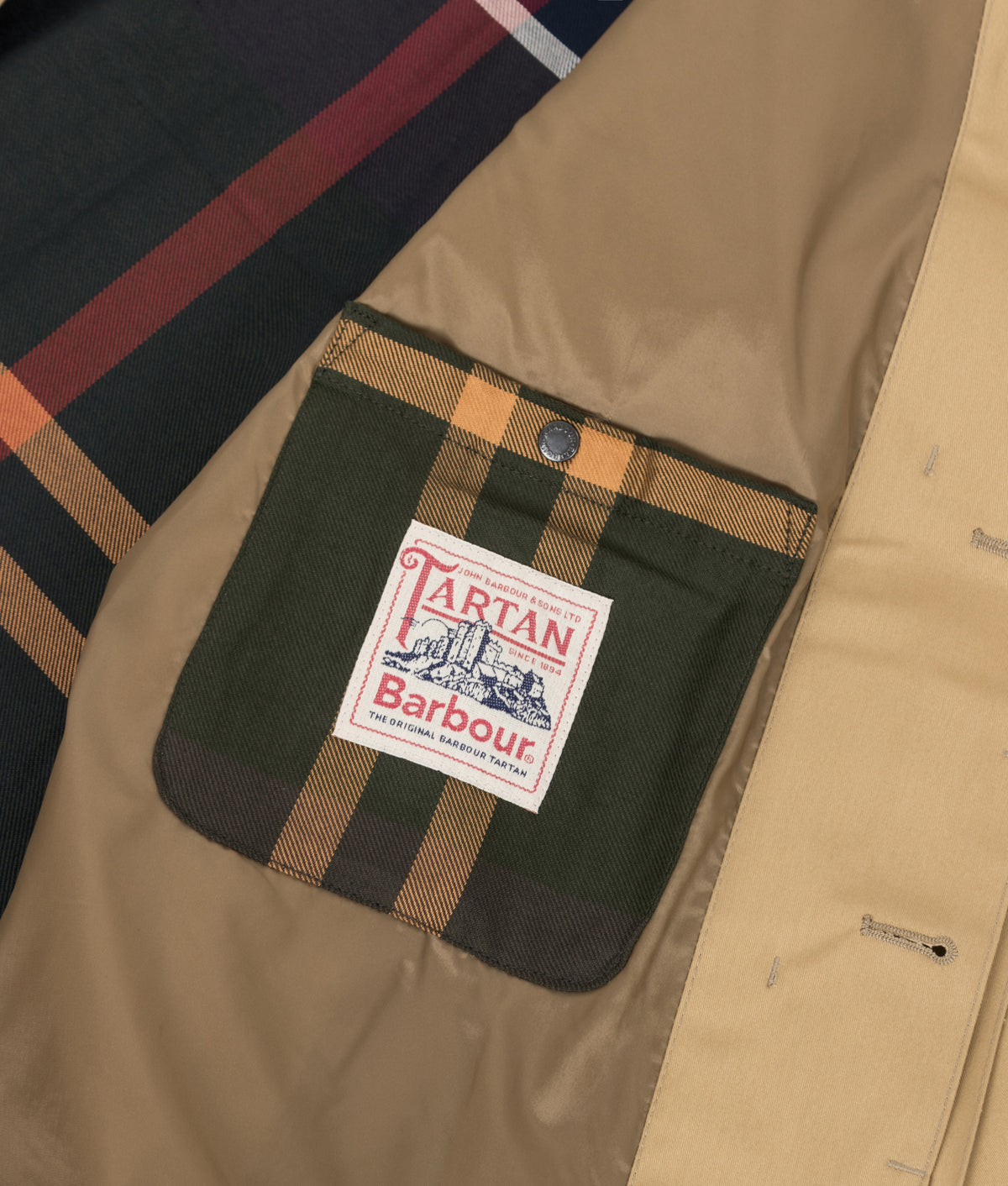 Barbour Lifestyle Lorden Waterproof Mac in Trench at EQVVS Menswear. Detail shot.