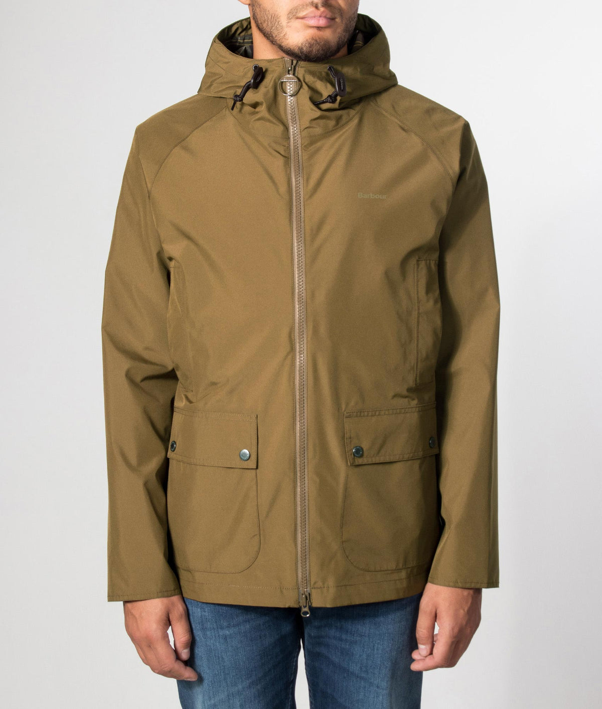 Barbour Lifestyle Hooded Domus Waterproof Jacket in Dark Sand at EQVVS Menswear. Model front shot.