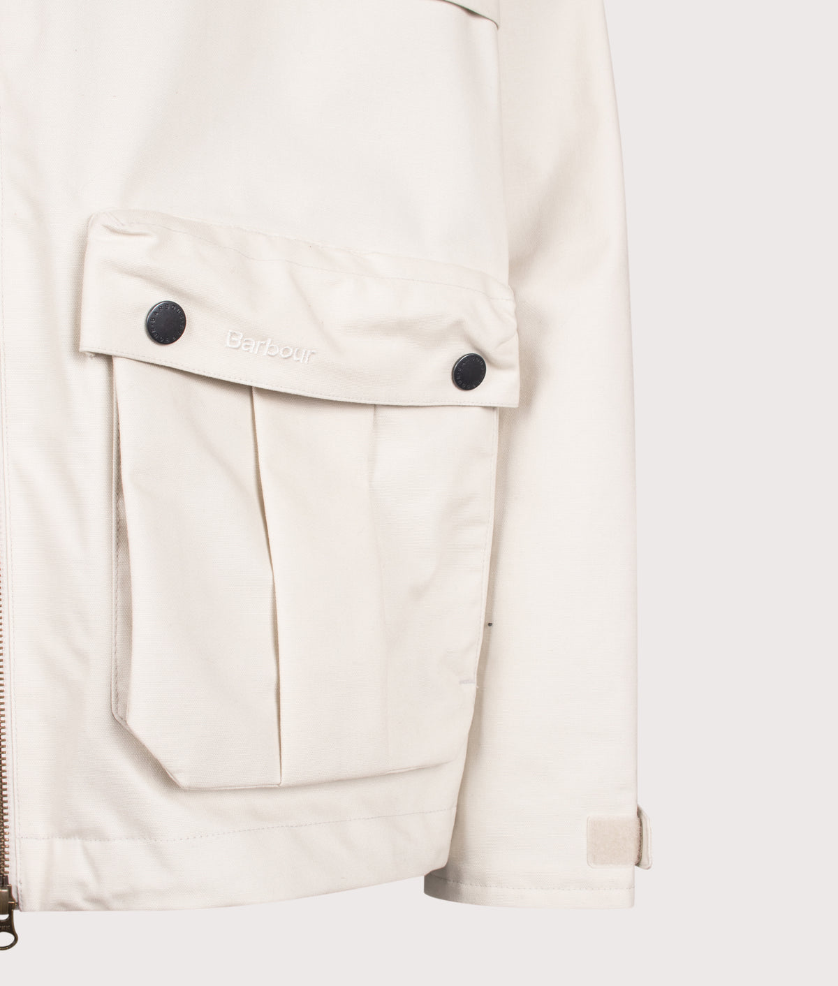 Barbour Heritage+ Ursula Wading Waterproof Jacket in Fog at EQVVS Menswear. Detail shot.