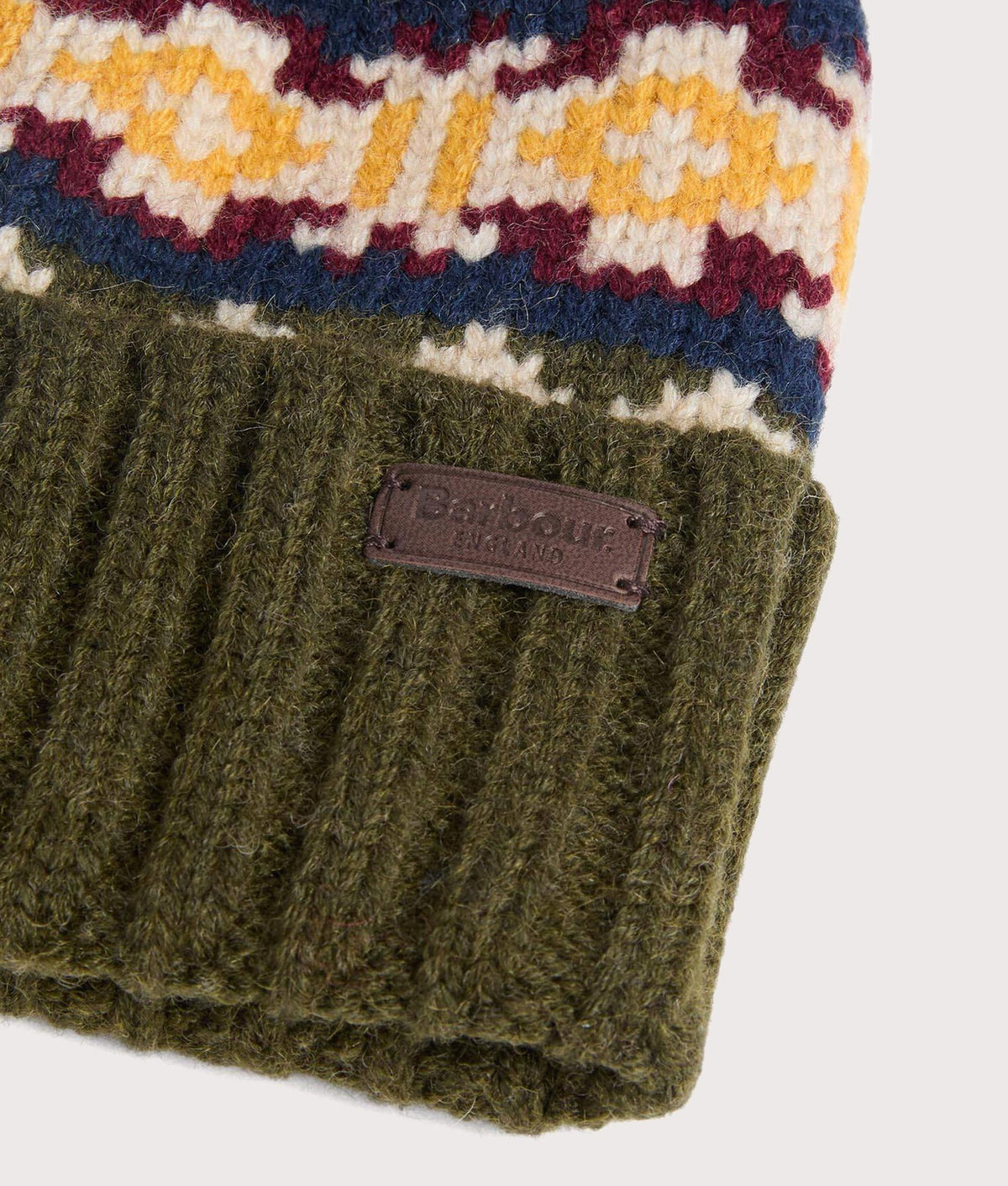 Barbour Lifestyle Kane Knitted Beanie & Gloves Gift Set in Dark Olive at EQVVS Menswear. Beanie detail shot.