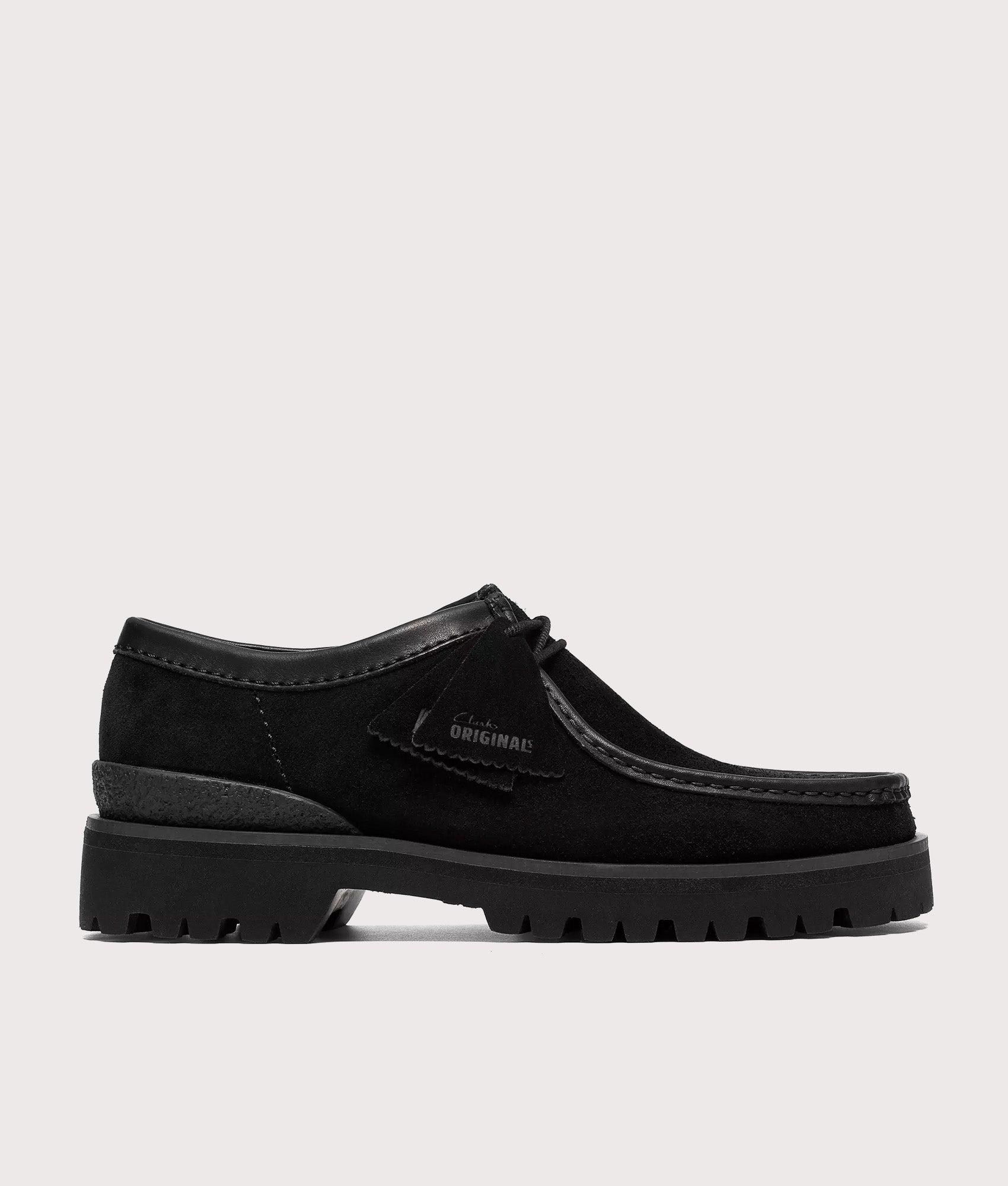 Clarks Originals Walla Yukoner shoes in black Combi Suede at EQVVS Menswear.   Side shot.
