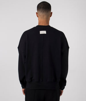 Oversized 1954 Sweatshirt in Black by Florence Black. EQVVS Back Angle Shot.