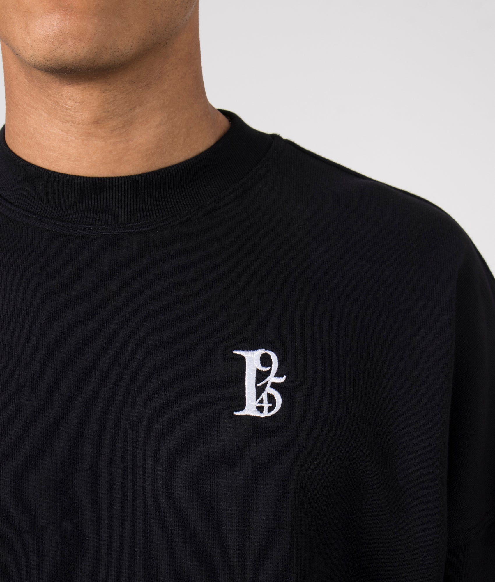 Oversized 1954 Sweatshirt in Black by Florence Black. EQVVS Detail Shot.