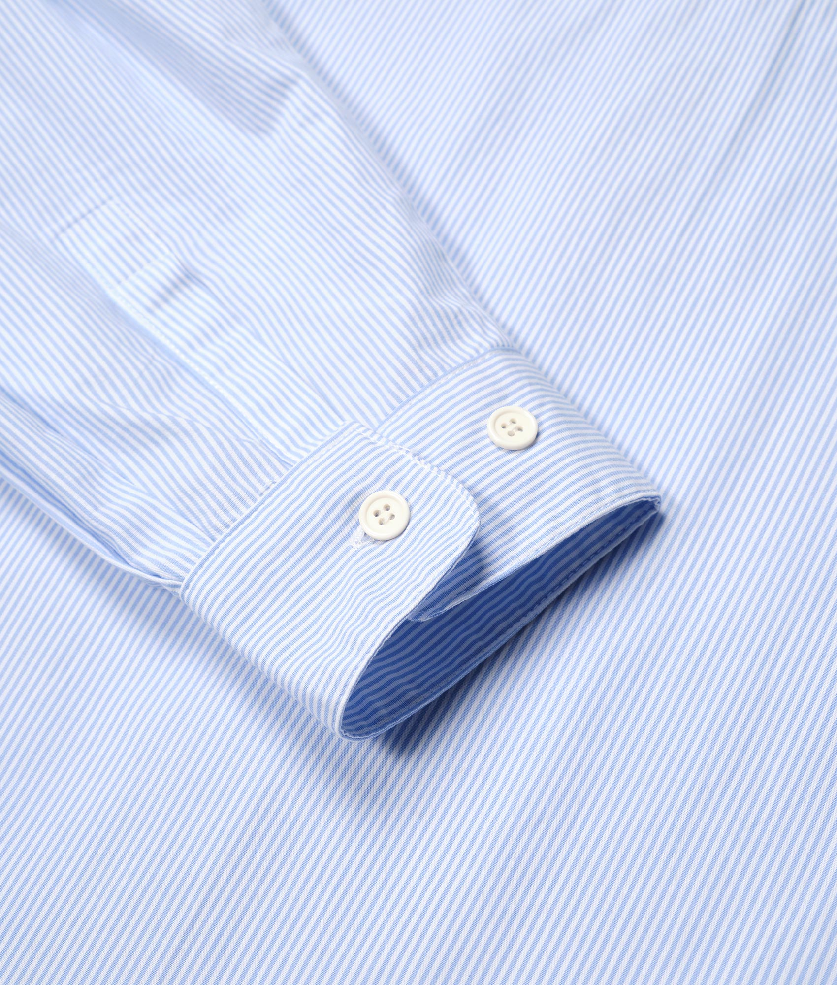 Oversized Striped Dress Shirt in Blue by MKI MIYUKI ZOKU. EQVVS Detail Shot.