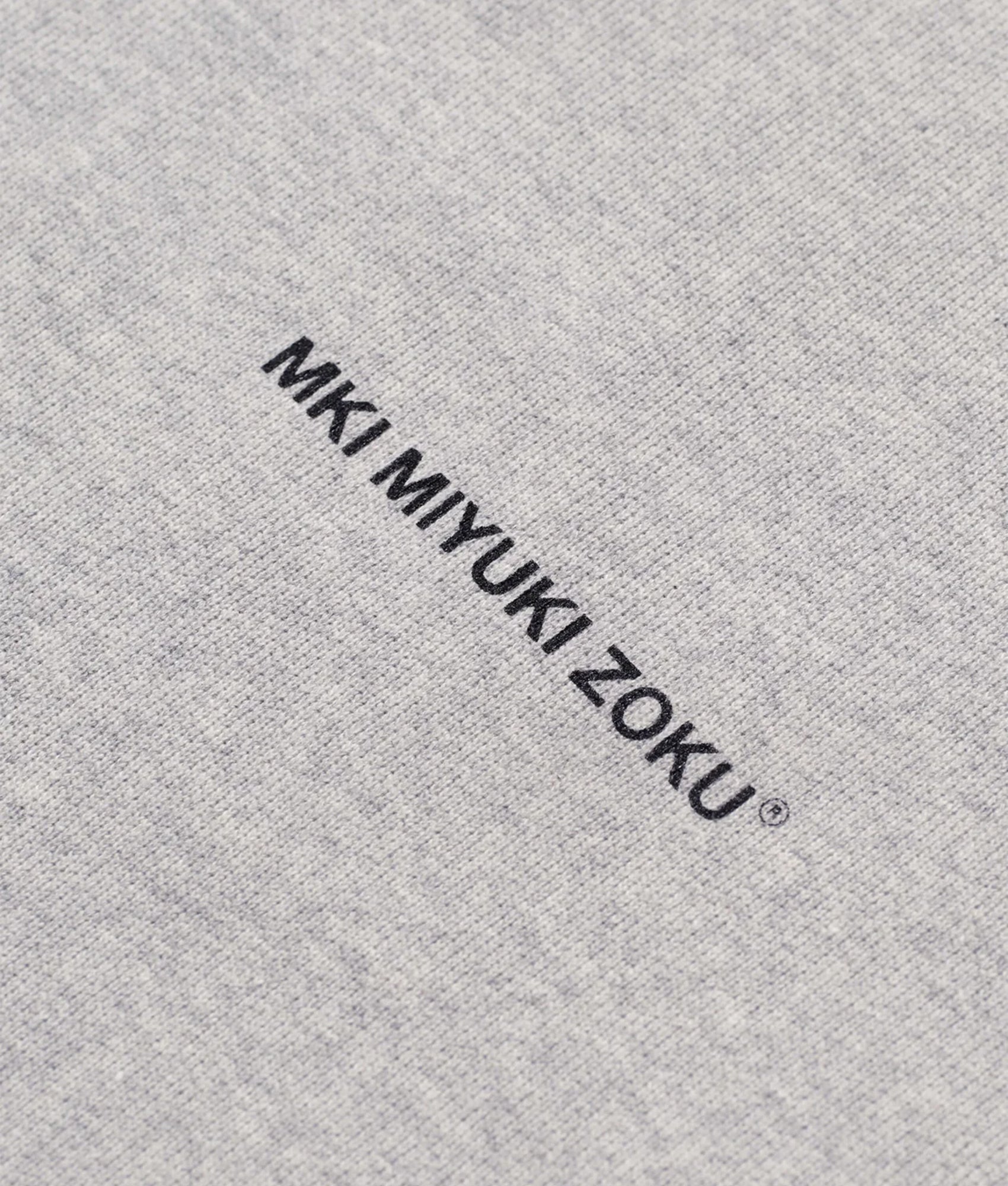 MKI MIYUKI ZOKU Oversized Uniform Crewneck Sweatshirt in grey at EQVVS Menswear. Detail shot.