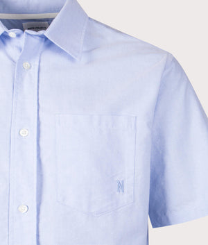 Norse Projects Ivan Oxford Monogram Short Sleeved Shirt in 7105 Pale Blue detail shot at EQVVS