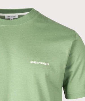 Norse Projects Relaxed Fit Johannes Organic Logo T-Shirt in 8124 Linden Green detail shot at EQVVS