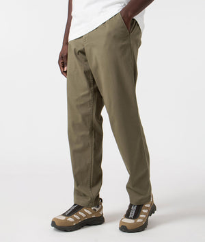 Ezra Relaxed Organic Stretch Twill Pants in Sediment Green by Norse Projects. EQVVS side angle shot.