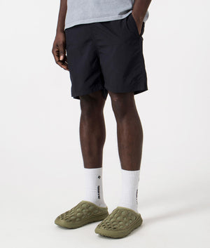 Hauge Recycled Nylon Swimmers in Navy by Norse Projects. EQVVS Side Angle Shot.